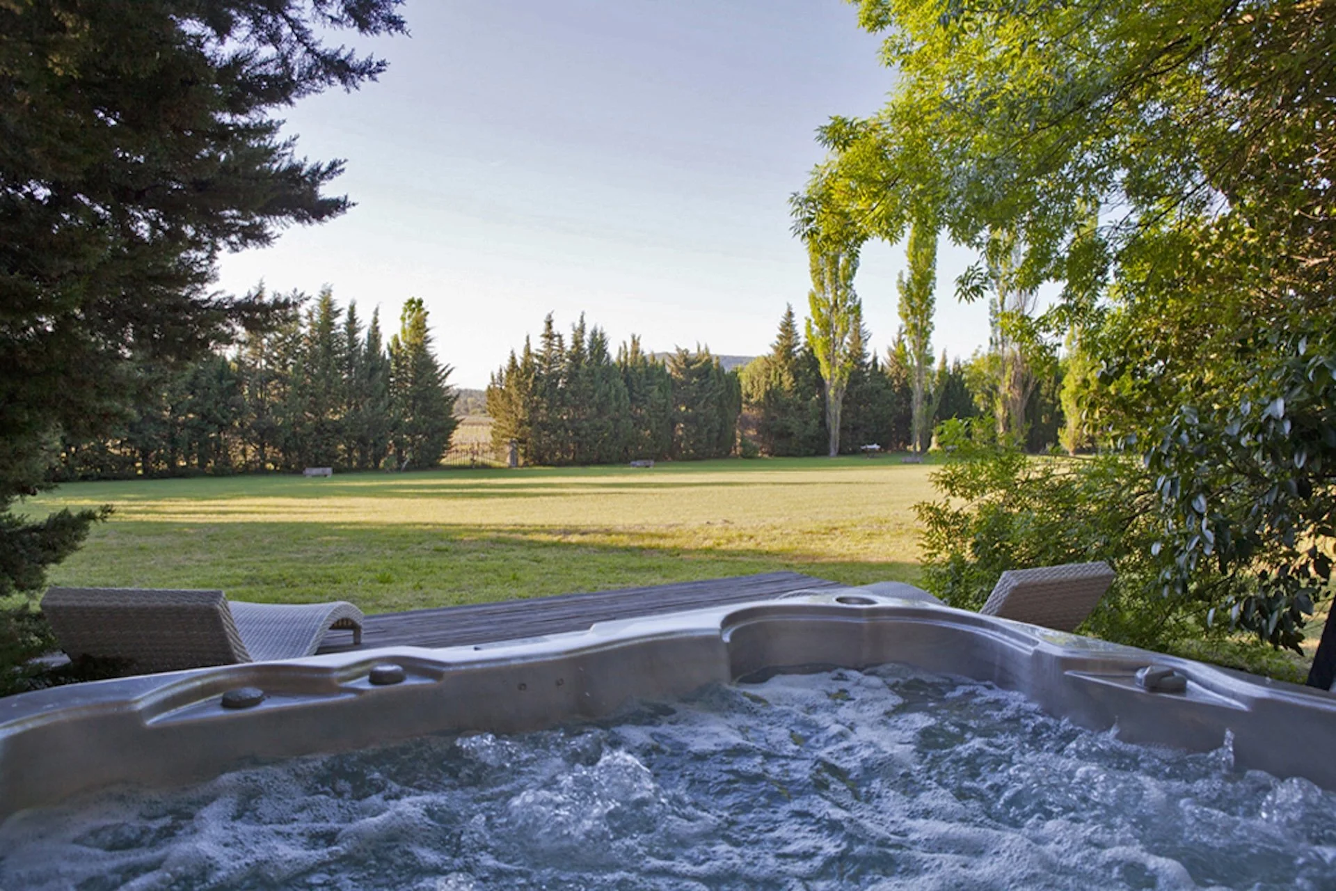 Exclusive villa with private jacuzzi at Domaine de Monteils, combining avant-garde design, Mediterranean gardens, and ultimate relaxation in the South of France