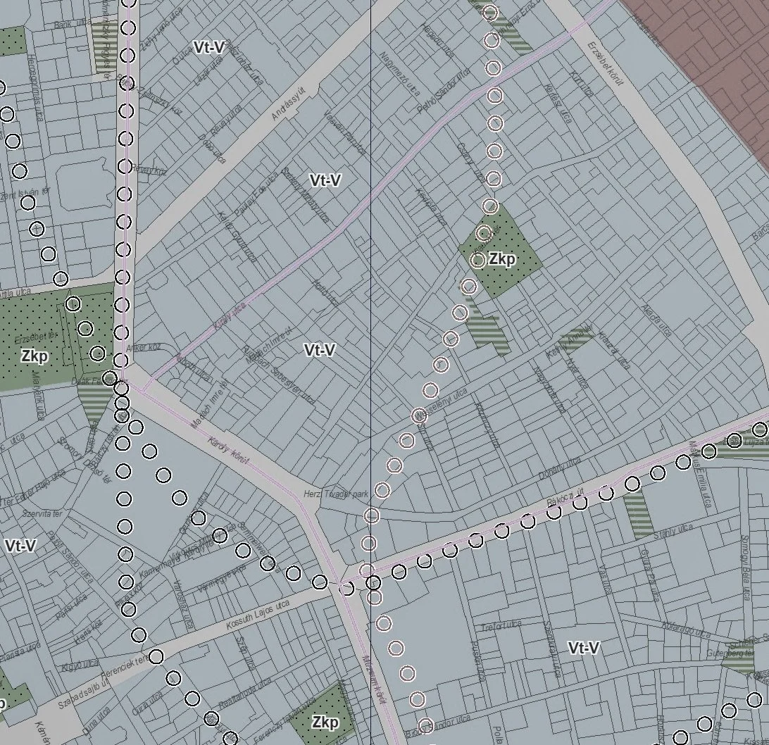 A detailed urban planning map showing streets, zoning areas labeled Zkp and Vt-V, and pathways marked with circles.