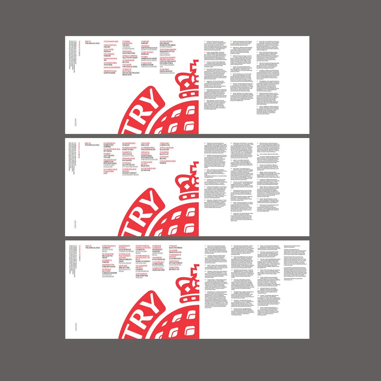 The image shows three copies of a printed page or magazine layout, featuring a large red graphic of a circular design with stylized text that appears to spell 'try' and a stylized red symbol. The pages contain small, dense black and red text arranged in columns, with the layout mirrored in each copy. The background is a plain gray surface.