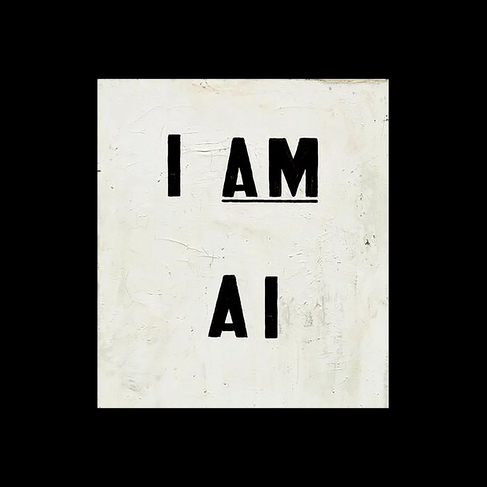 White sign with black lettering stating "I AM AI" in a simple, bold font.