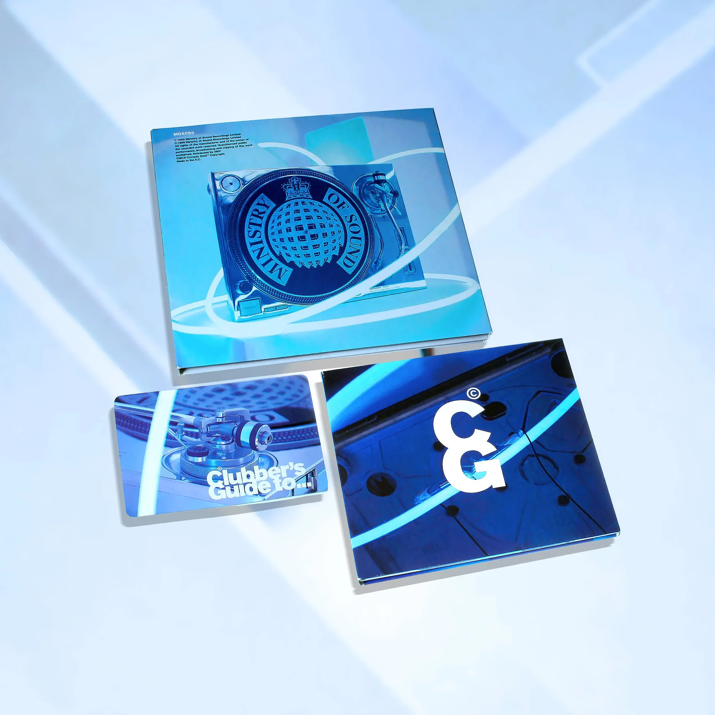 Blue and black album covers and booklets with DJ and record themes, featuring the Ministry of Sound logo and a guide to clubbing.