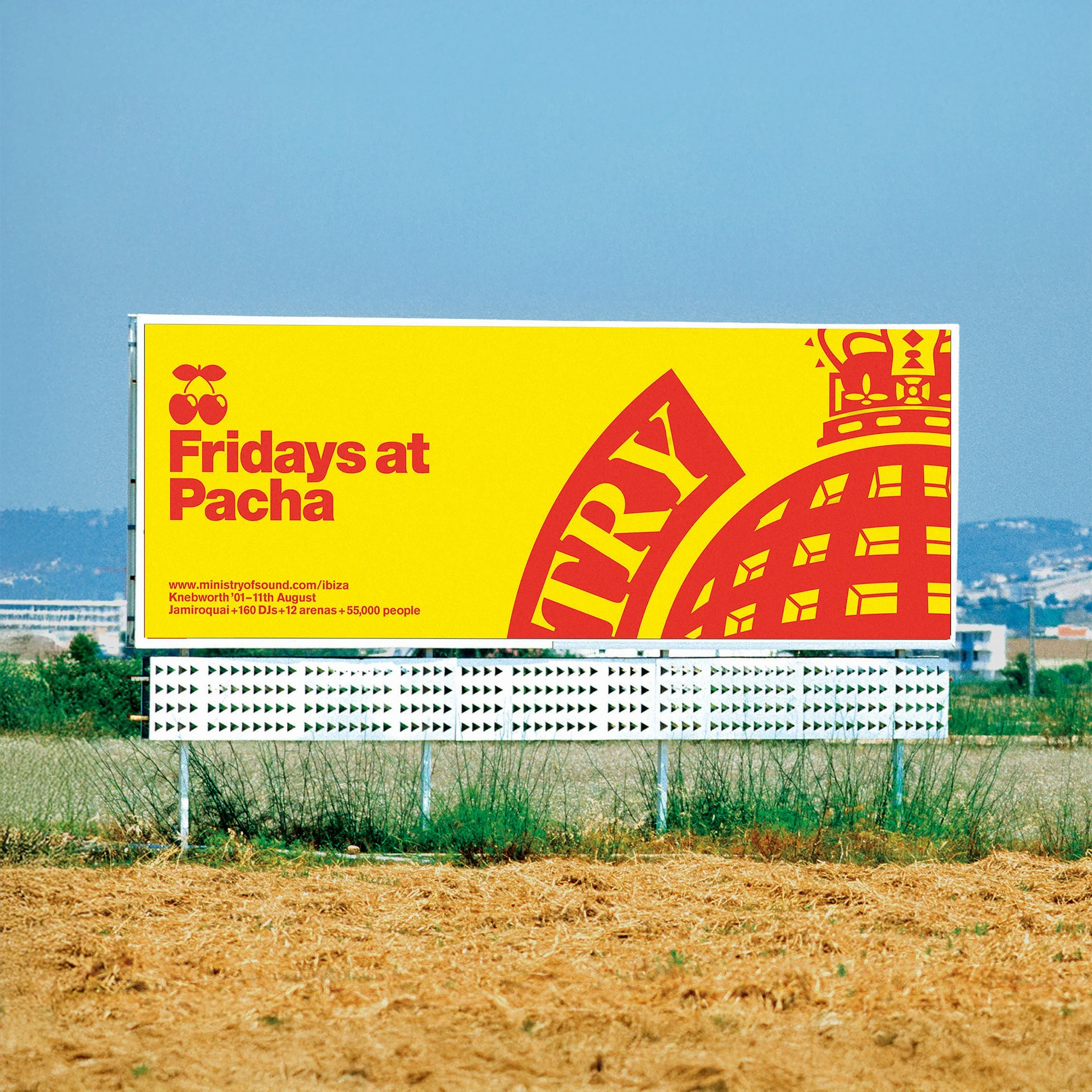 Billboard advertising Fridays at Pacha music event in Ibiza with red and yellow colors, featuring cherries icon and stylized letter M.