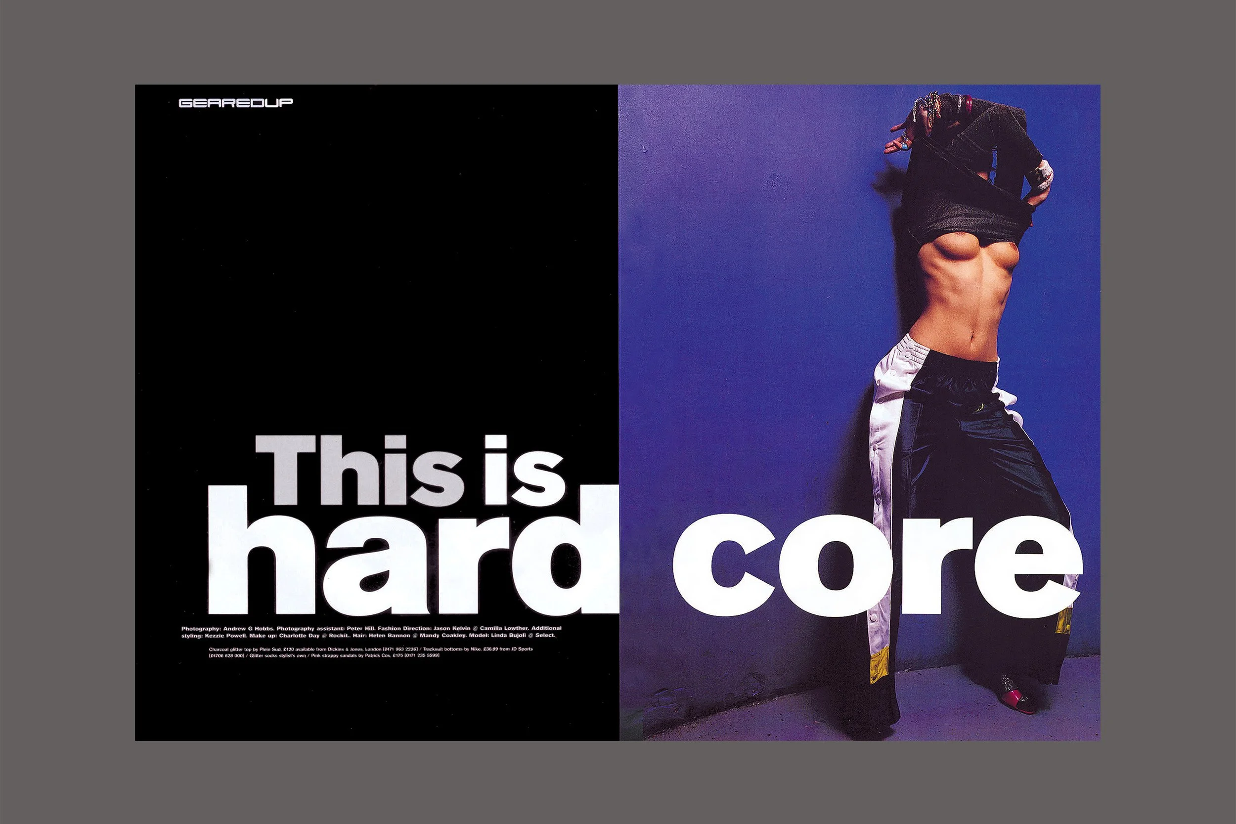A split background with text on the left and a person lifting a shirt to reveal their abs on the right. The left side has a black background with white bold text that reads 'This is hard'; the right side features a person in black athletic pants and sneakers, pulling up a shirt to show their toned abdominal muscles against a purple wall.