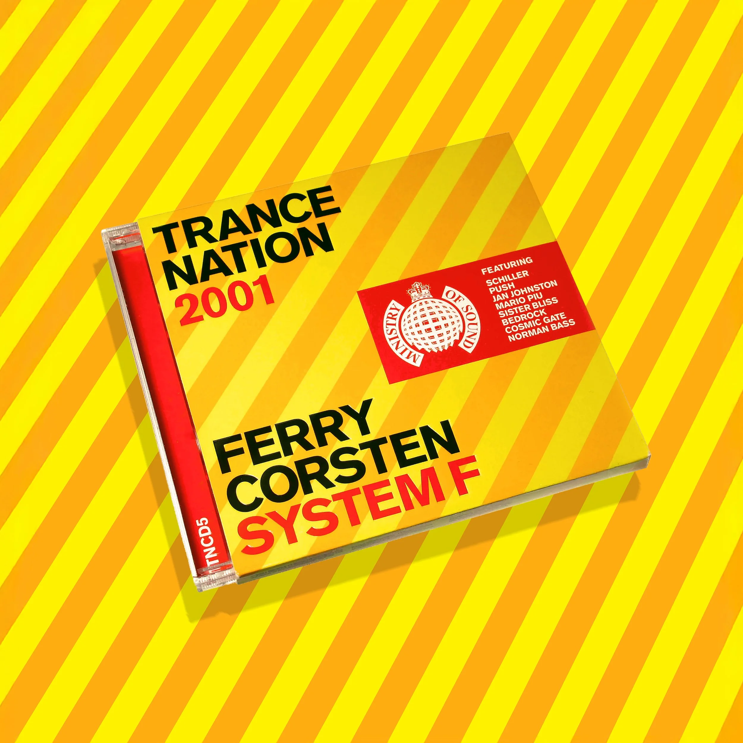 A CD case titled "Trance Nation 2001" featuring Ferry Corsten System F, with a yellow and orange striped background.