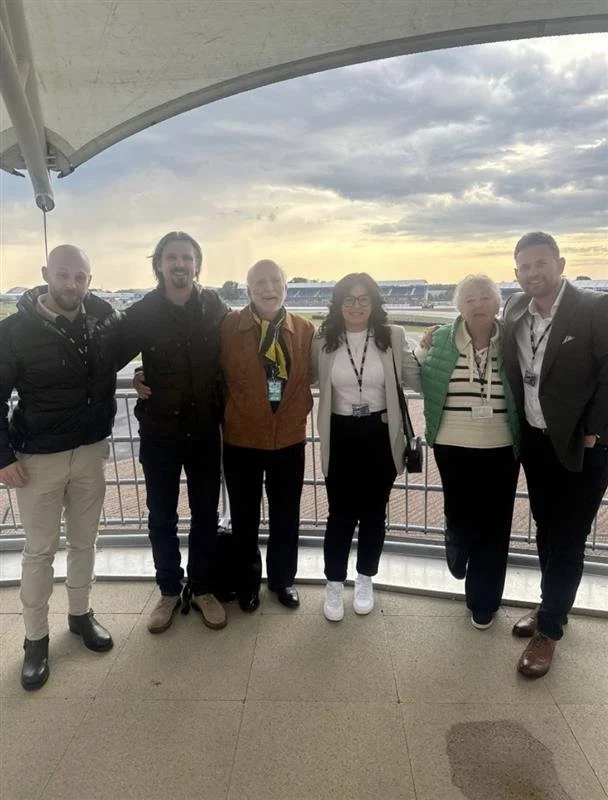 Group of people at Silverstone for business