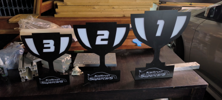 Custom laser cut and CNC bent steel motorsport trophies. Durable, precision-made awards with bold designs — perfect for racing events and competitions.