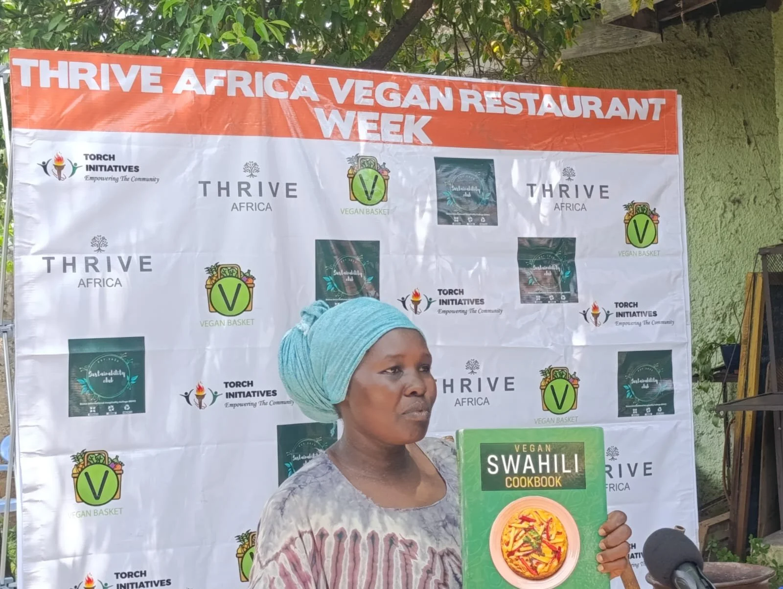 Jelel with the cook book.jpg