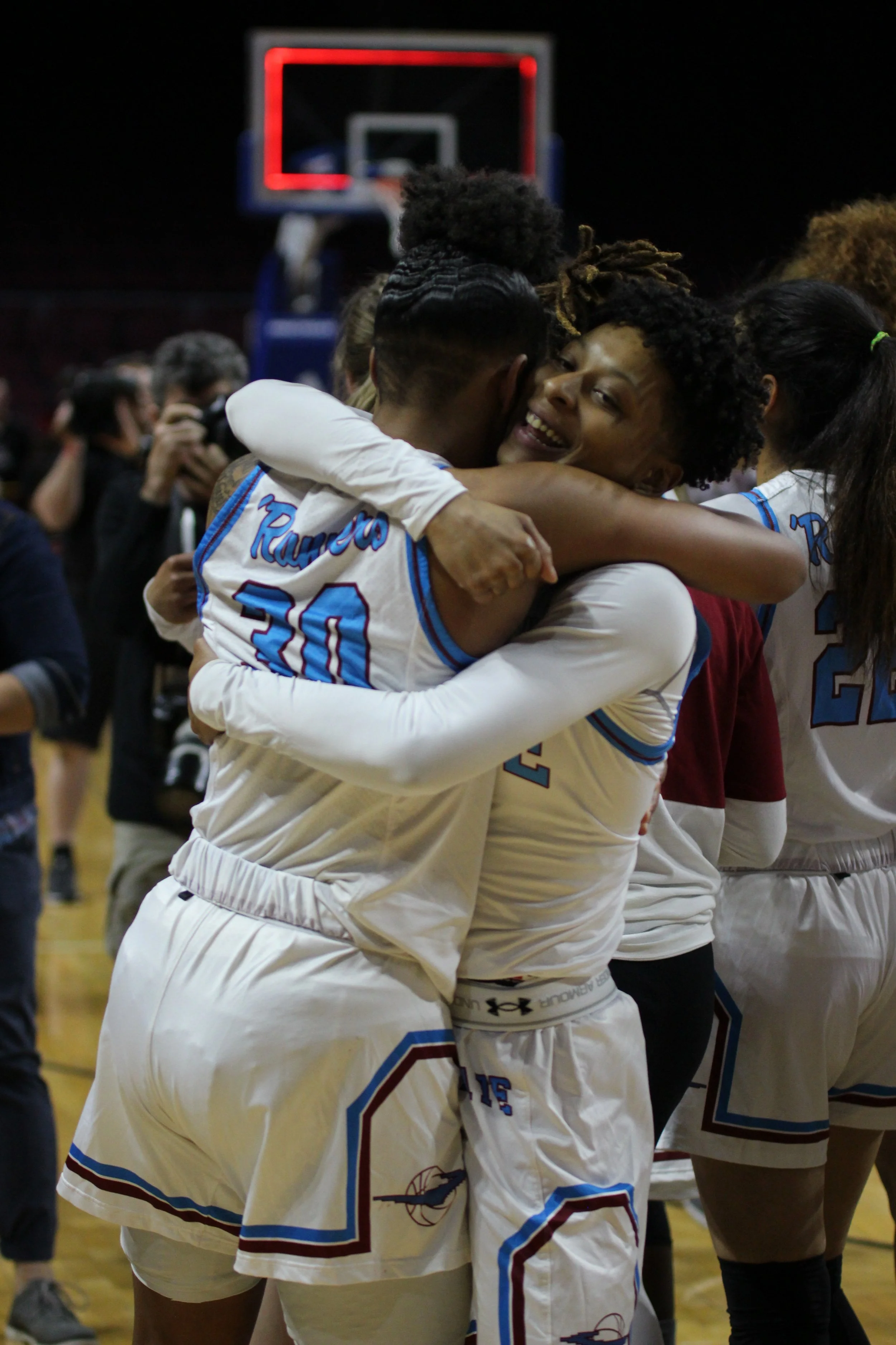 Gia Pack and Aaliyah Prince hug after winning the 2019 Western Athletic Conference women's championship against UT Rio Grande Valley on Saturday March 16, 2019 in the Orleans Arena. (Photo by Eli Whitney/Kokopelli)