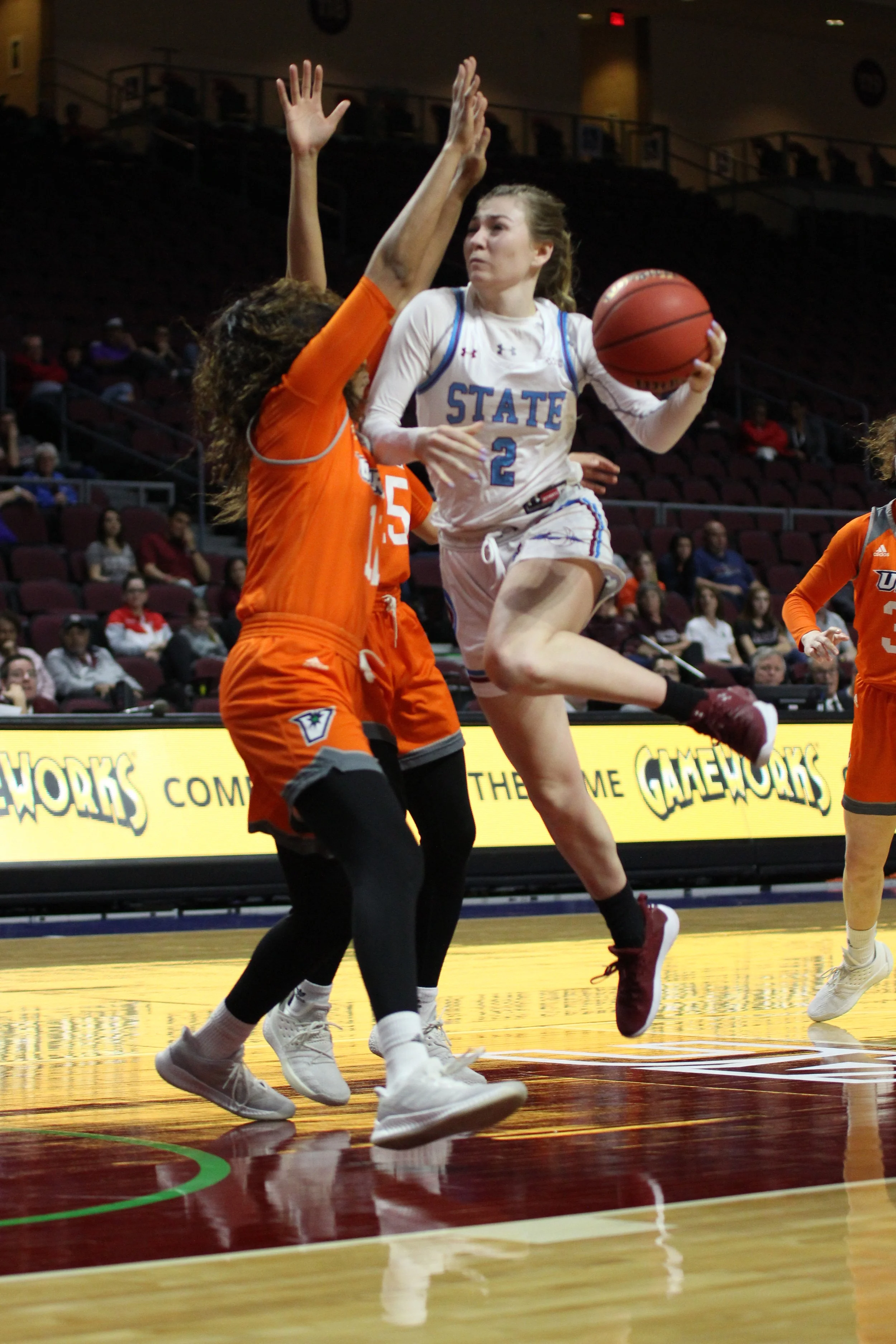 Aggie senior guard Brooke Salas drives around the perimeter against UMKC in the WAC Tournament semifinal round on Friday, March 15, 2019, at Orleans Arena. (Photo by Eli Whitney/Kokopelli)