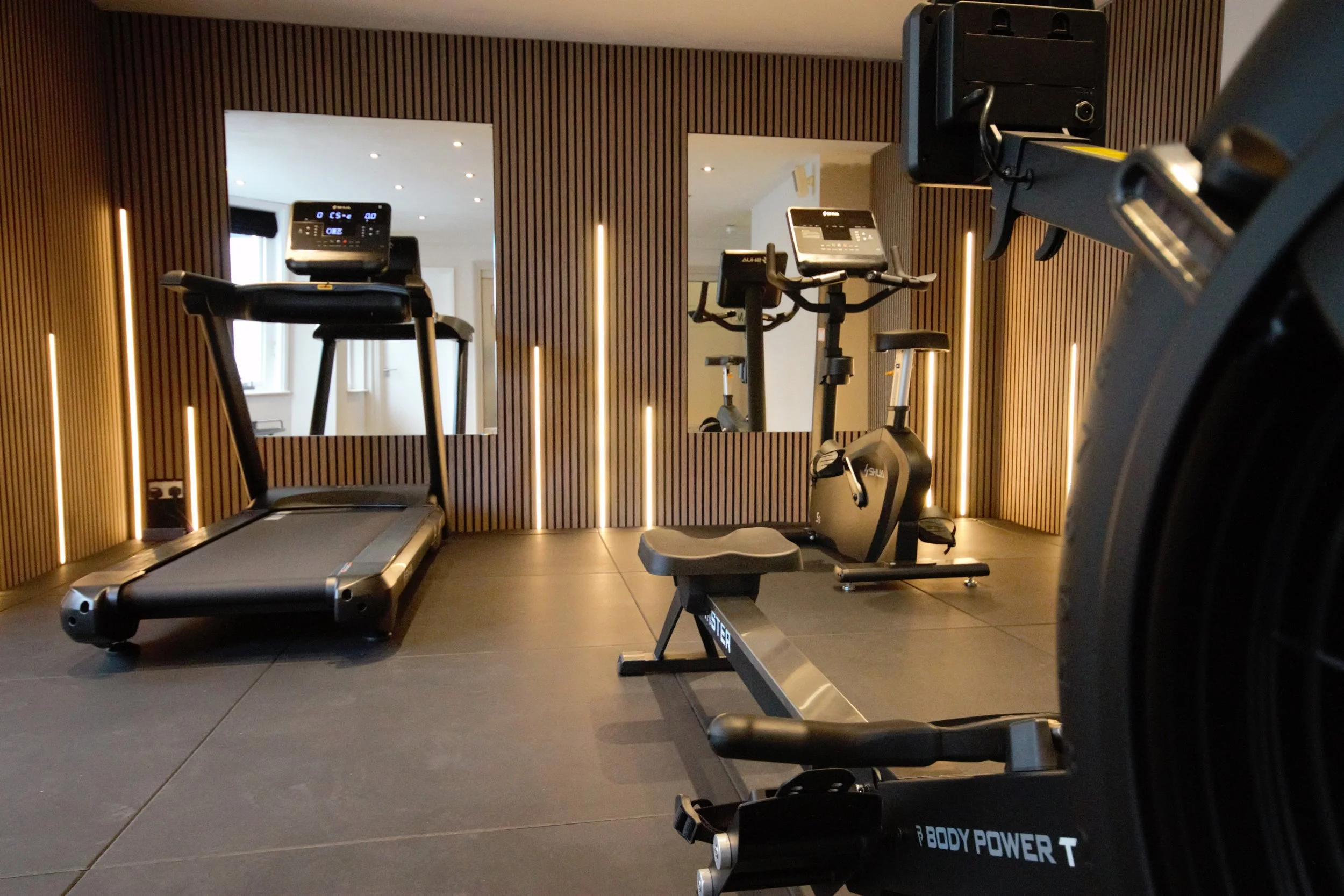 Gym at Andover House Hotel with treadmill, exercise bike, rowing machine, free weights, multi-gym, free for all hotel guests