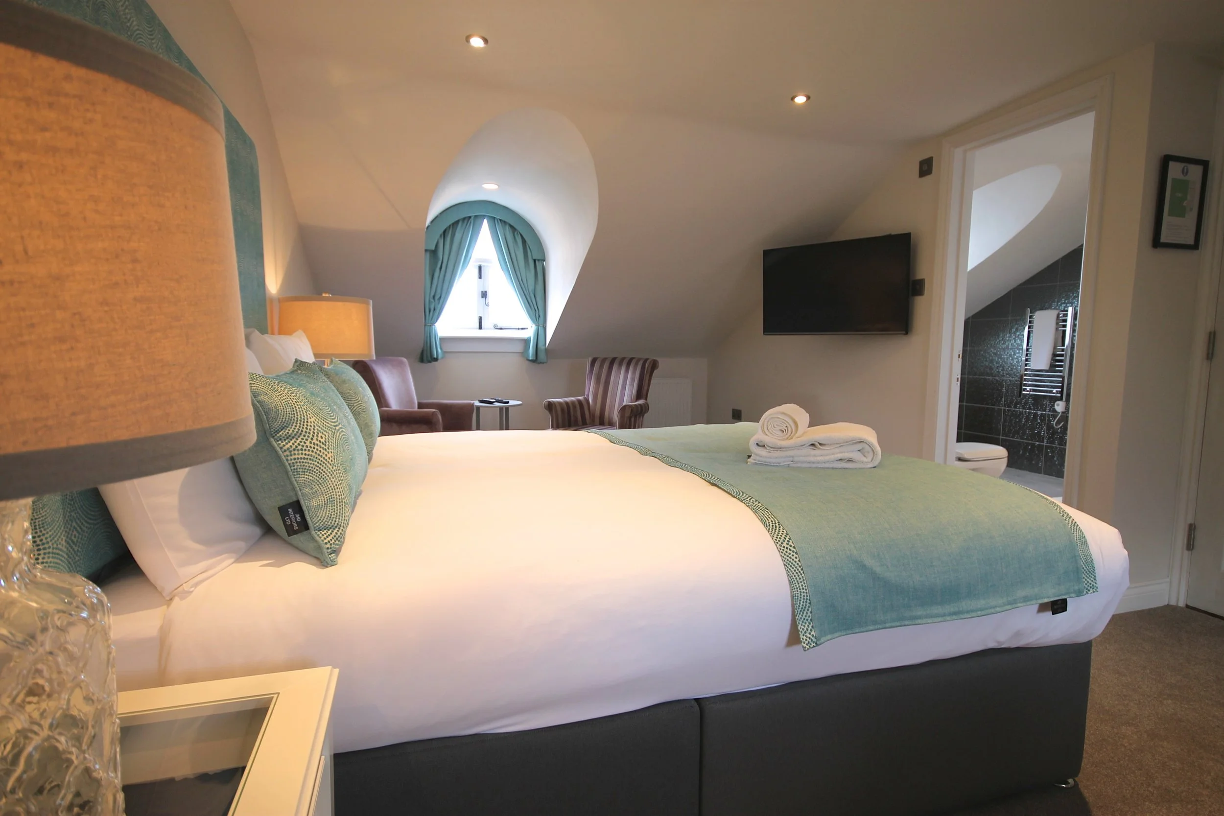 Superior Attic room at Andover House Hotel in Great Yarmouth with king-size bed and walk-in shower
