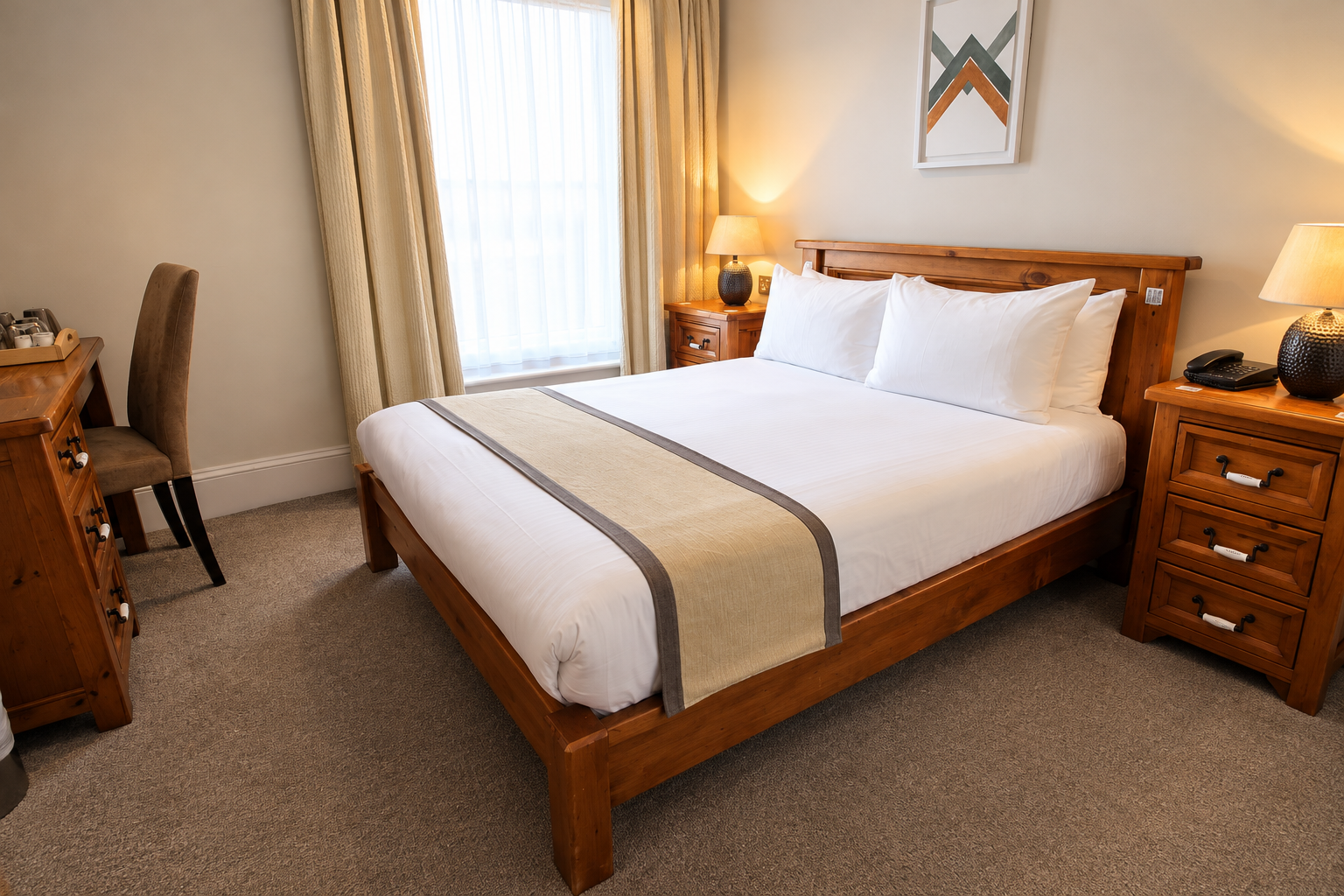 Comfortable small double hotel room at Andover House in Great Yarmouth with work desk, TV and ensuite facilities