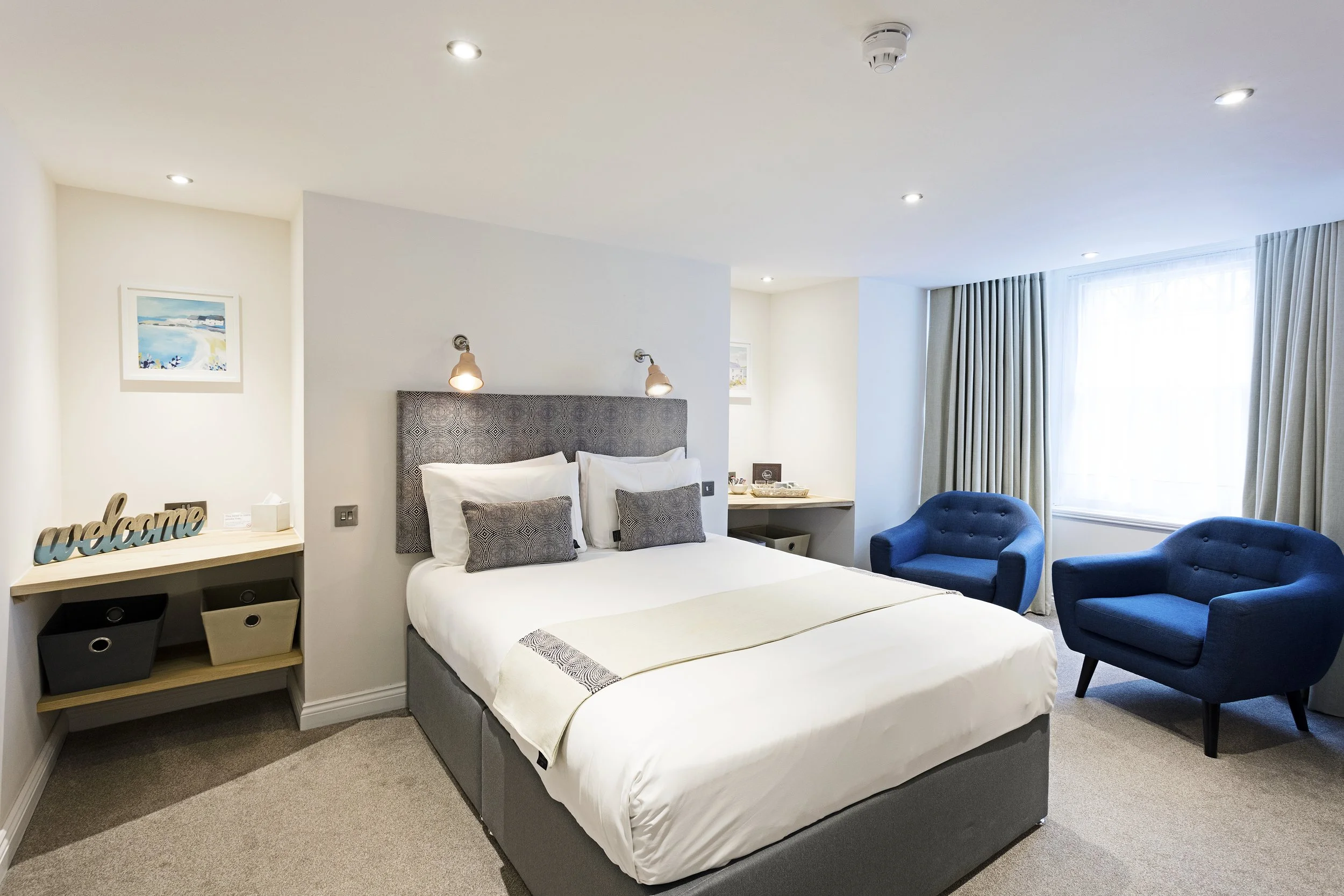 Superior Lower Ground boutique room at Andover House Hotel in Great Yarmouth with bay window lounge and walk-in shower