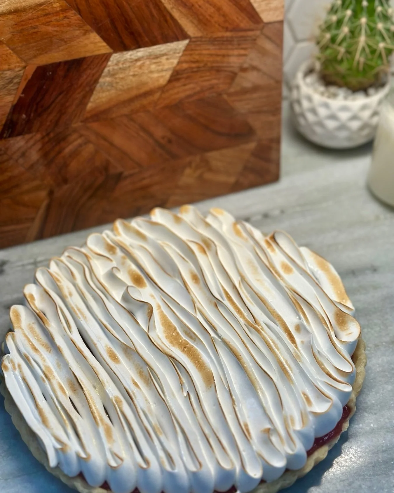 Happy Thanksgiving Eve!  May your potatoes be mashed, your yams candied, the wine plentiful, and the table filled with beautiful flaky pies. 

🥧 details:
 &bull;sweet short crust pastry
&bull;cranberry curd
&bull;toasted Italian meringue 

#thanksgi