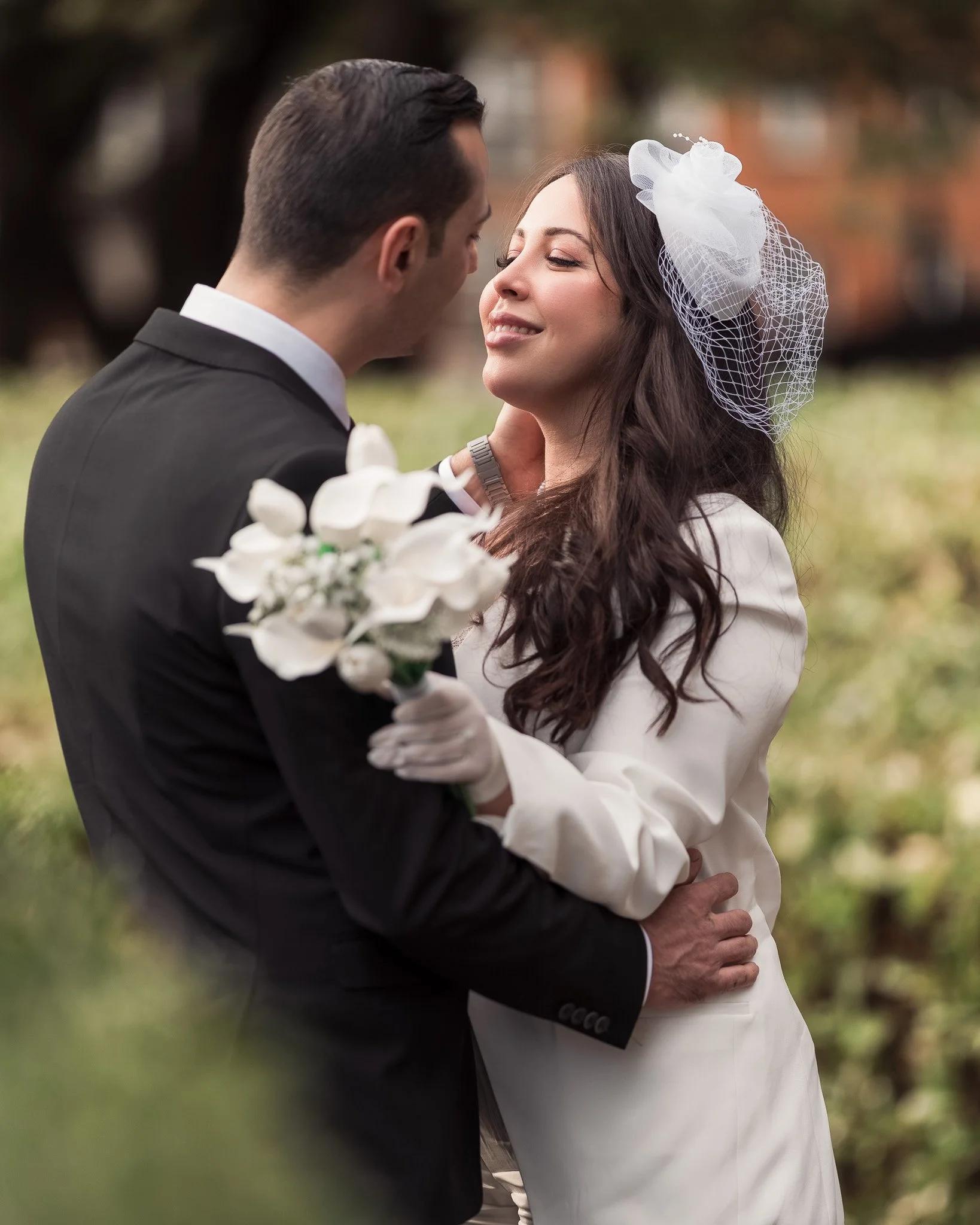 Bride and groom sharing a tender moment during their intimate wedding in Dublin.