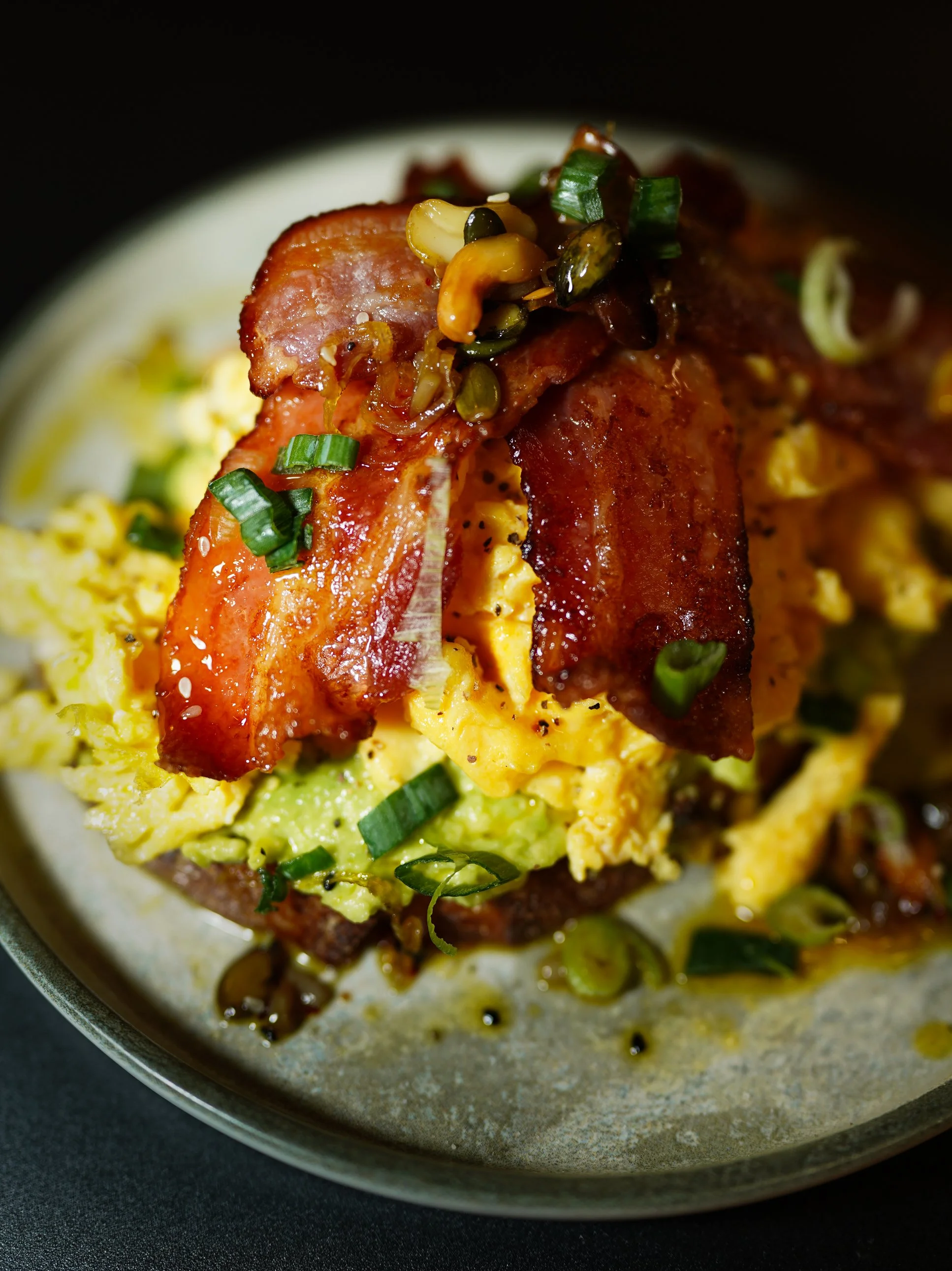 Eggs and bacon brunch with fresh herbs in Dublin restaurant.