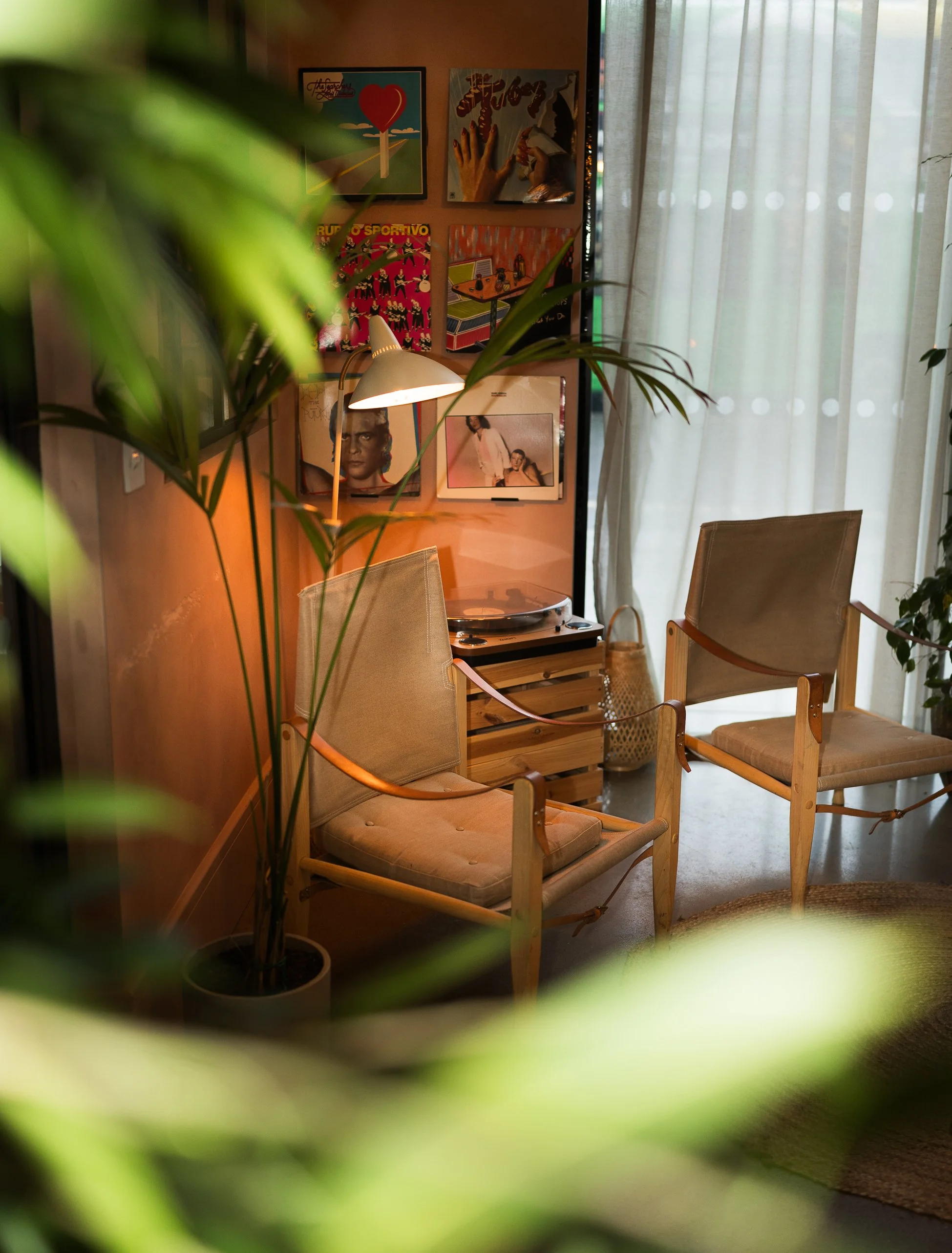 Cozy café interior with warm light and wooden chairs, Dublin restaurant photography.