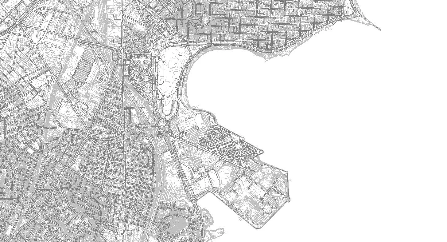 A grayscale map of a city showing streets, parks, and bodies of water.