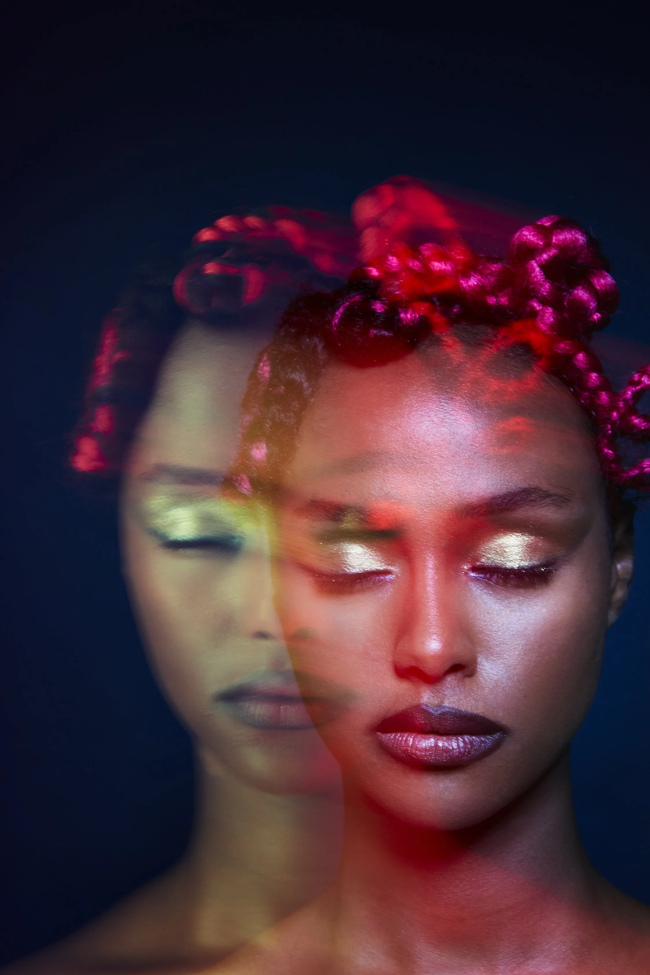 A cropped beauty image of a female model with eyes closed and a duplicate image imposed