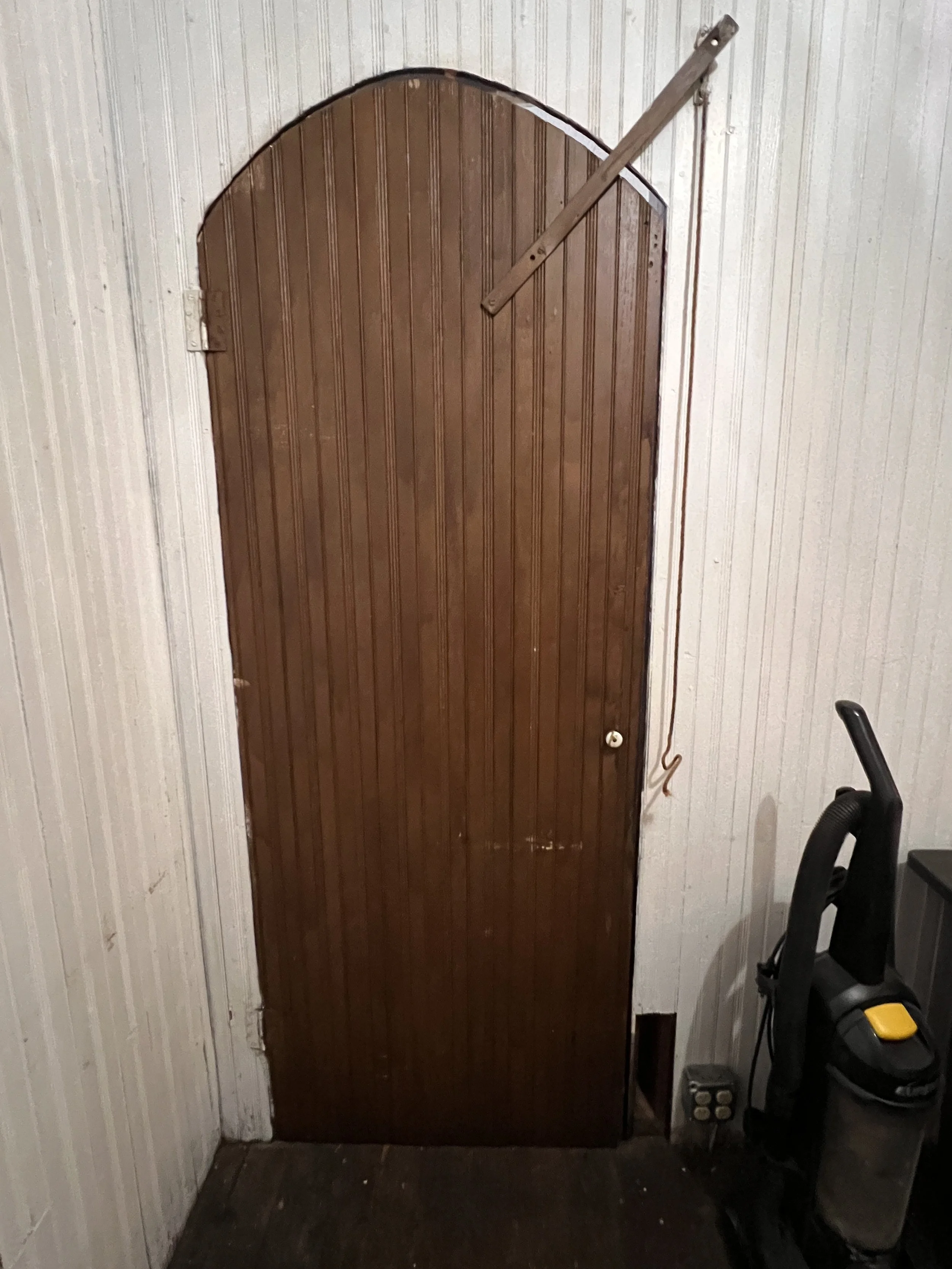 Original sanctuary entry doors before restoration