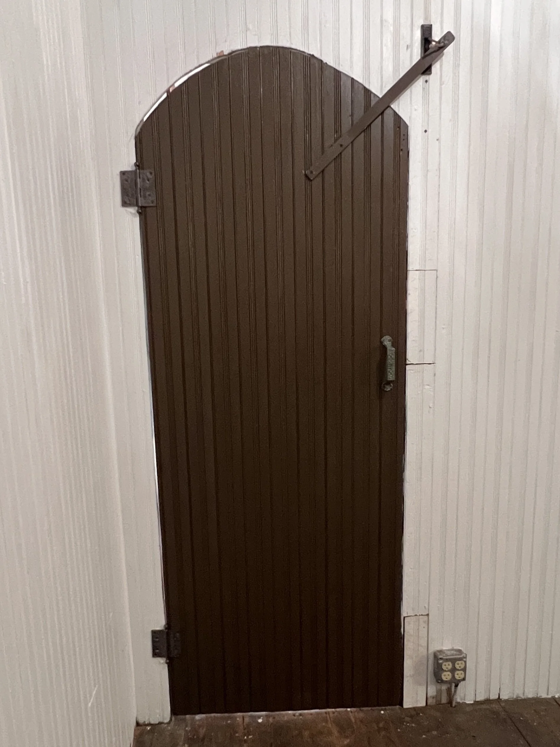 Original doors reinstalled with closing mechanism