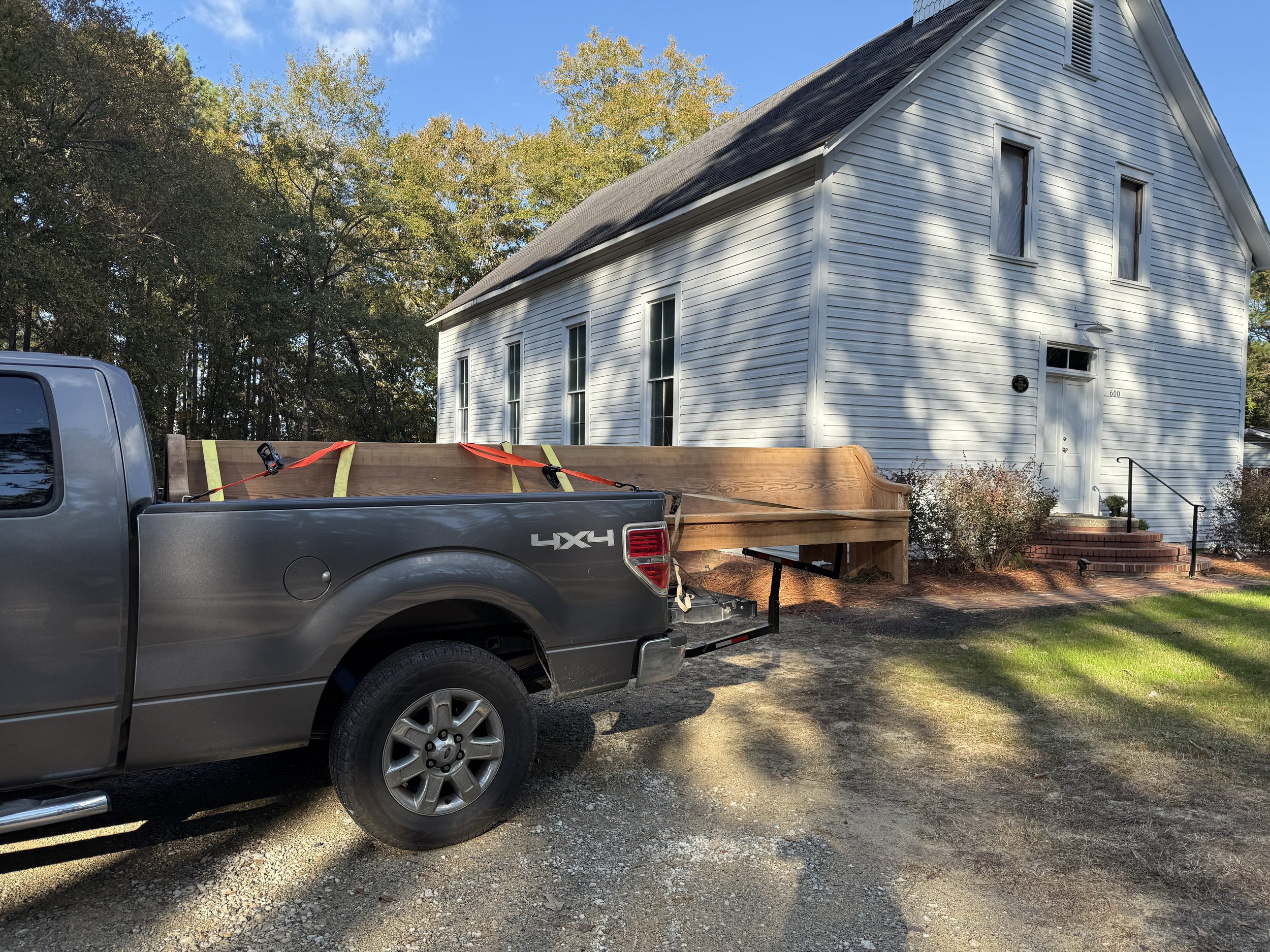 Sanded pews returning from Autryville