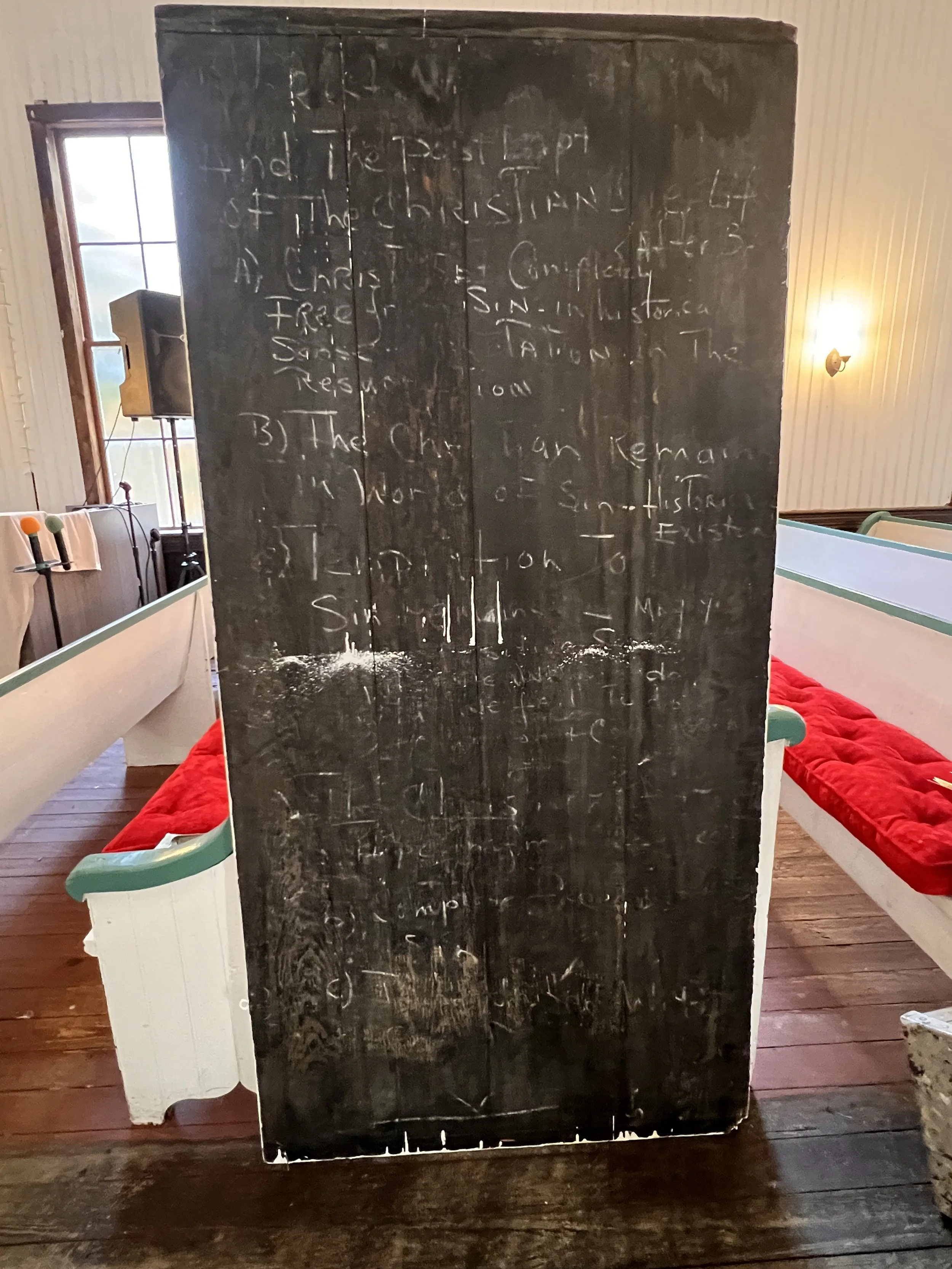 Makeshift chalkboard with catechism lesson found behind bathroom wall