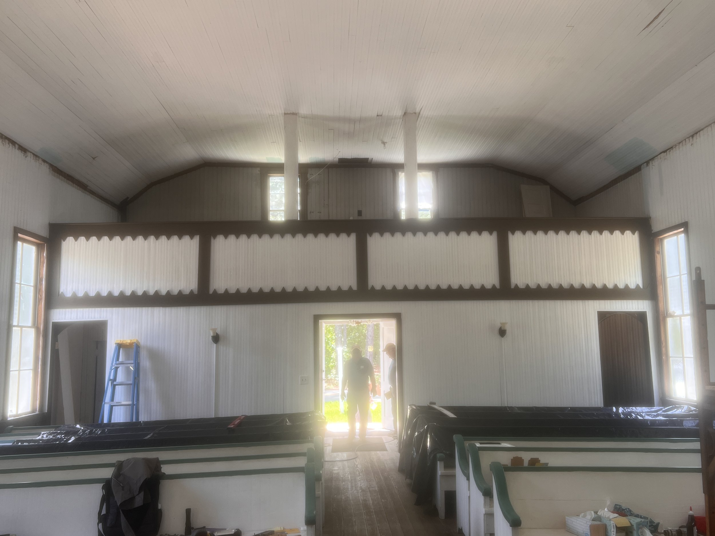 Back sanctuary wall pediments installed