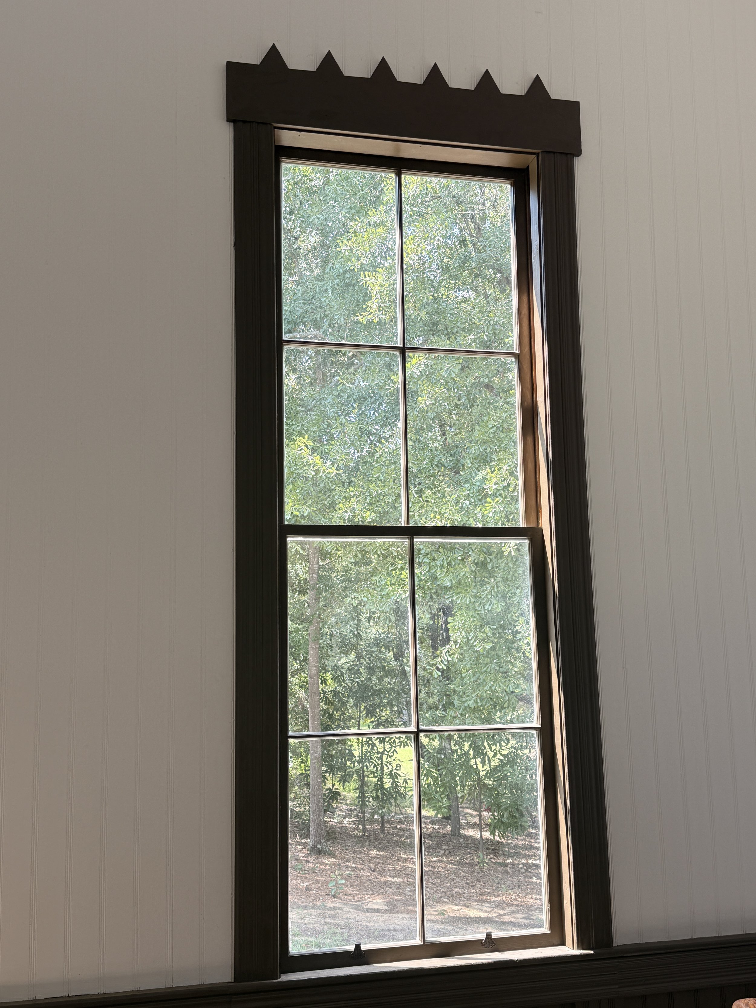 Completed window with trim and pediments