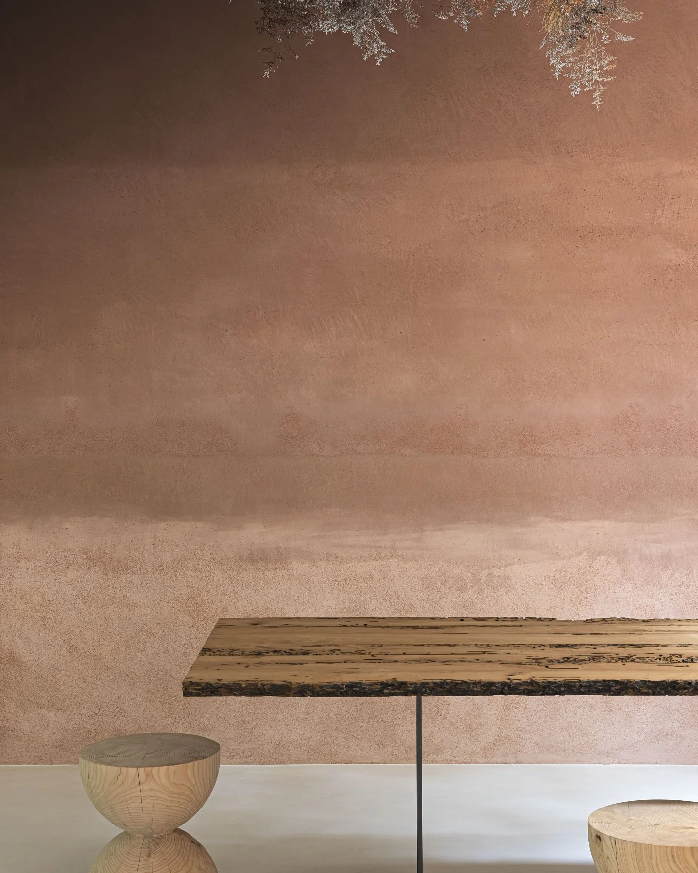 This wall is Materia Viva Cocciopesto, one of six variants in our Materia Viva line, mixed with a terracotta component and finished with a stainless steel trowel.

Once the coat is dry, we sand it back, which is what brings the terracotta up through 