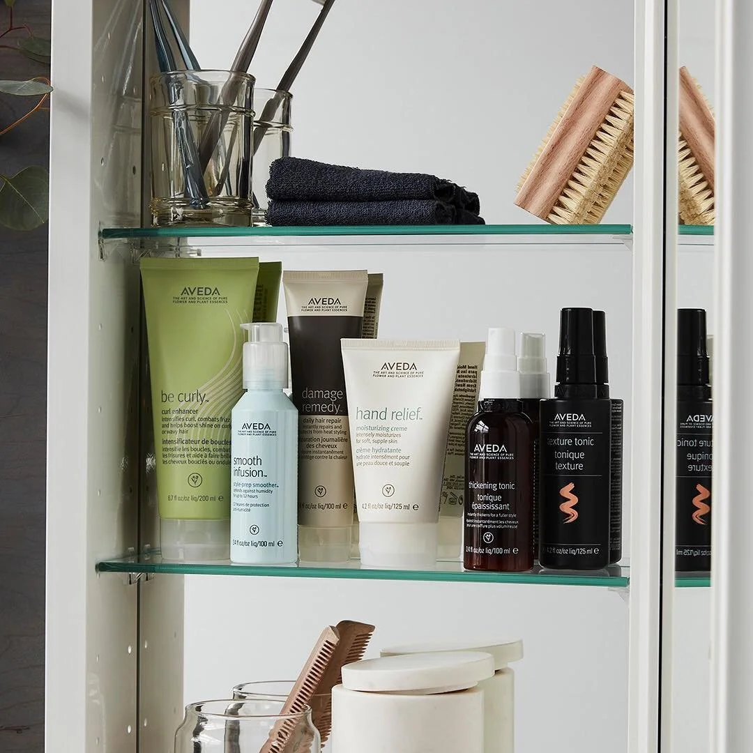 A curated selection of Aveda hair and skin care products displayed at Davanti Salon. Guests can bring home salon-quality results with Aveda’s plant-powered formulas designed for scalp health, styling, and self-care rituals.