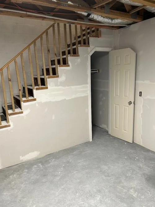 Finished basement including interior door and added lights with a light switch