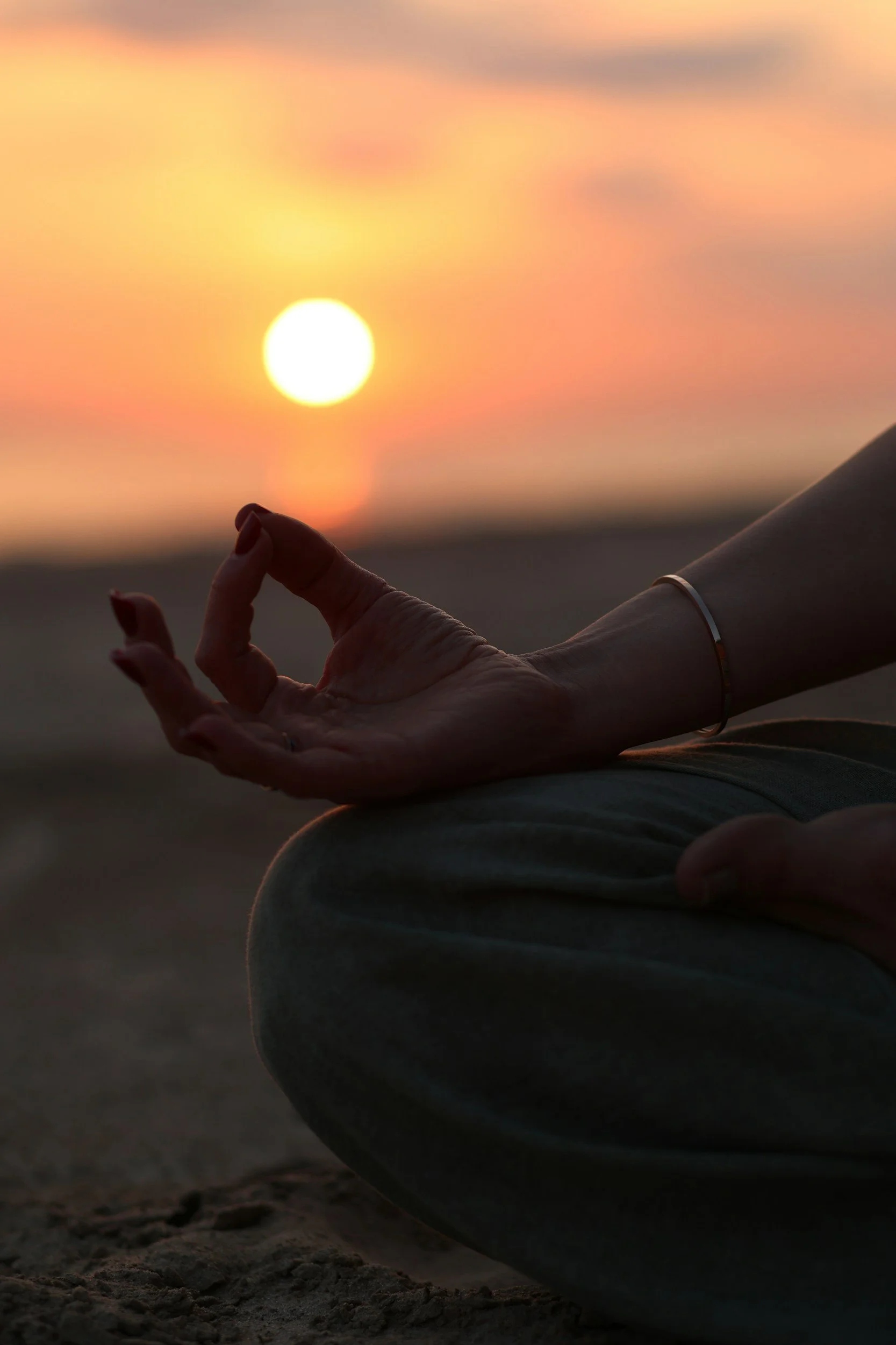Woman practicing yoga and meditation at a holistic wellness center in Rancho Santa Fe, supporting women’s wellness and mind-body connection.