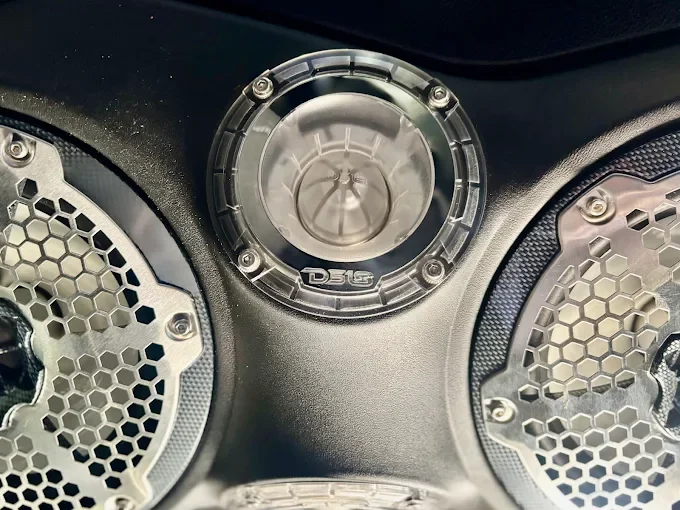 three DD Audio SS series amplifiers and comprehensive DS18 speakers, including a massive custom soundbar housing 4 8-inch speakers and 4 tweeters. Paired with dual 12-inch subwoofers, this system delivers phenomenal, clean sound. Central FL audio