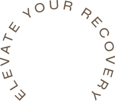 Circular black background with the phrase 'ELEVATE YOUR RECOVERY' written around the perimeter in light-colored text.