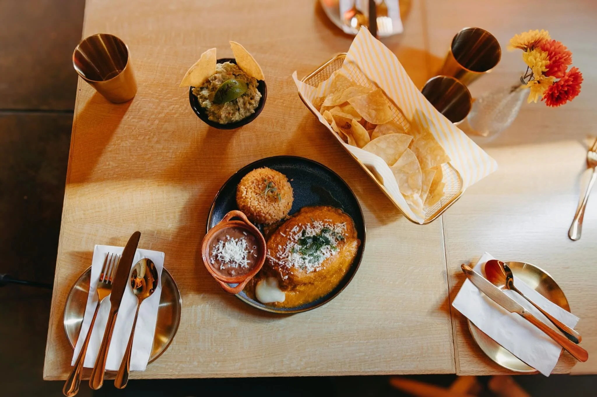 Dinner is served at @madrinapdx ! Gather the family and join us for fresh, flavorful dishes made with care. From the first bite to the last, our bold flavors will have you telling your friends, family, and neighbors where to find their new favorite m
