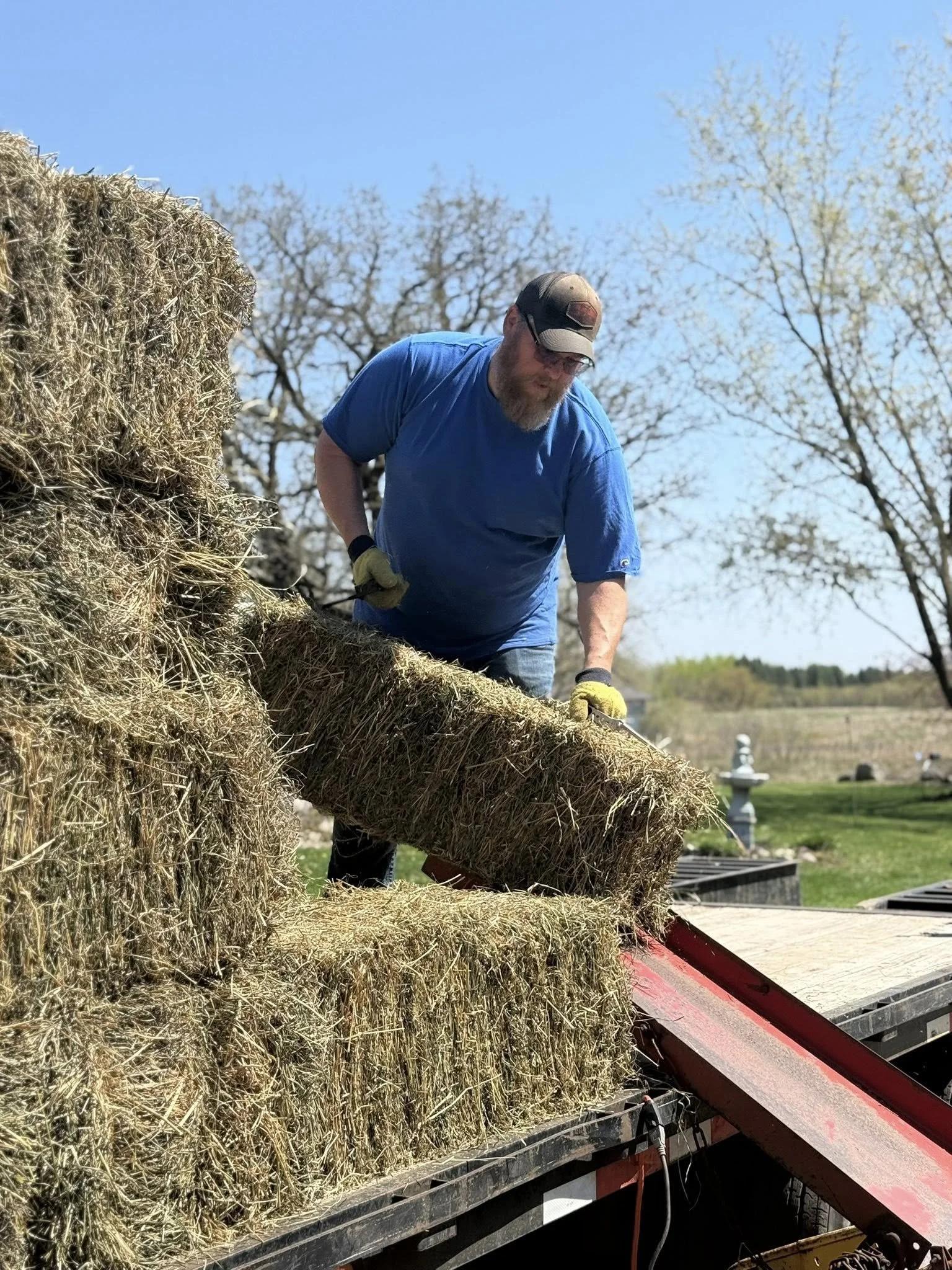 Farmer Ted with Hay for the Beef cows.jpg