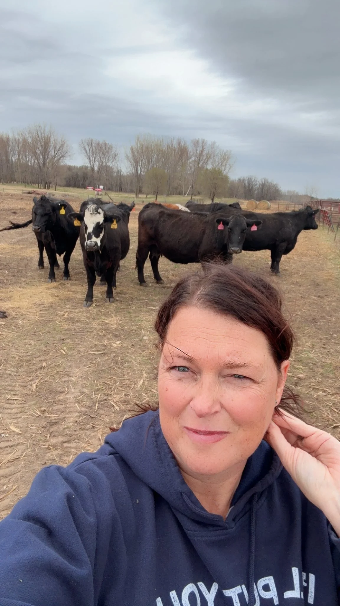 Farm Mom with the photo op with the cattle.jpg