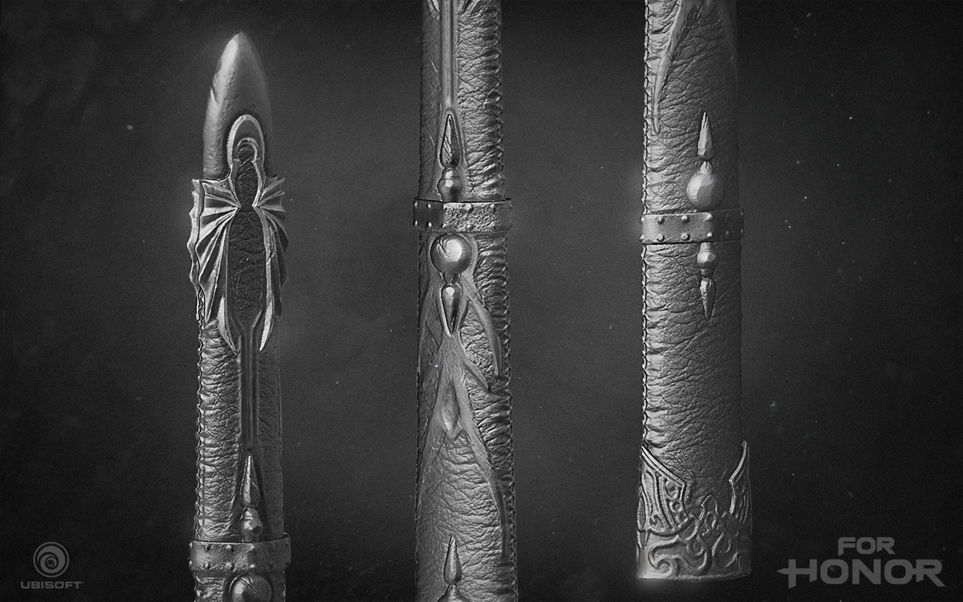 Three elaborately decorated swords or blades with textured handles, displayed against a dark background, with Ubisoft and For Honor logos in the bottom corners.