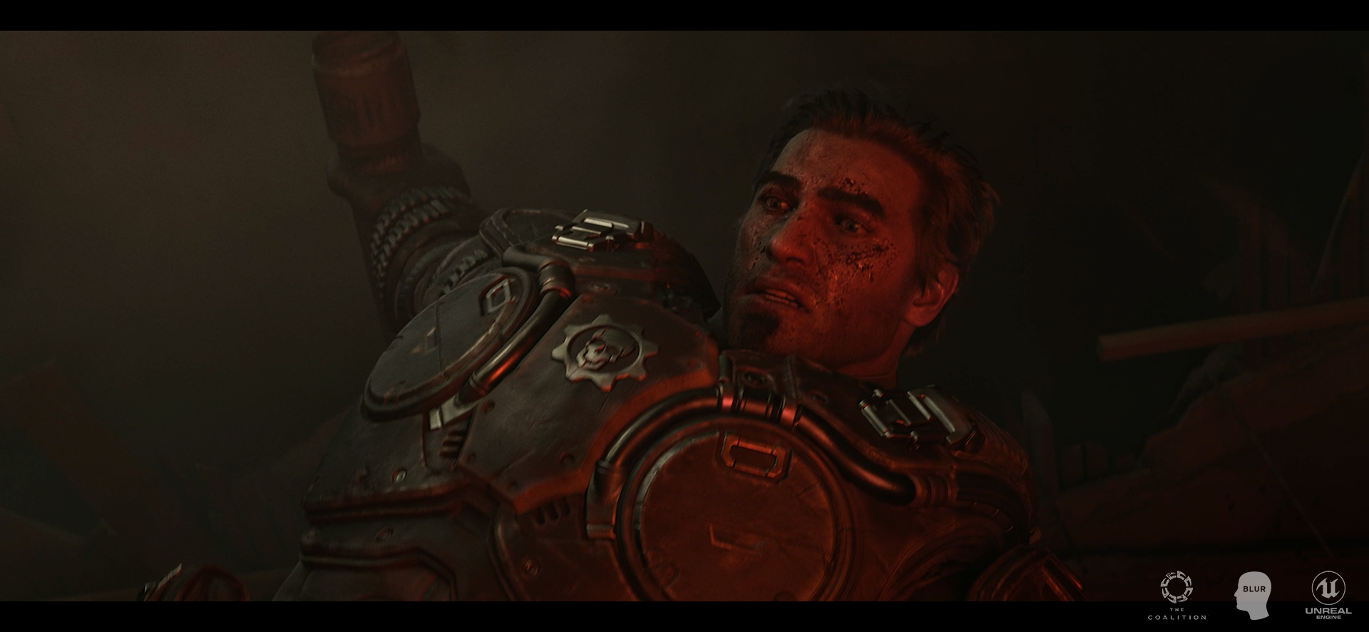 A male soldier in futuristic armor, lying on the ground with a shocked or pained expression, blood and dirt on his face, in a dark, smoky environment.