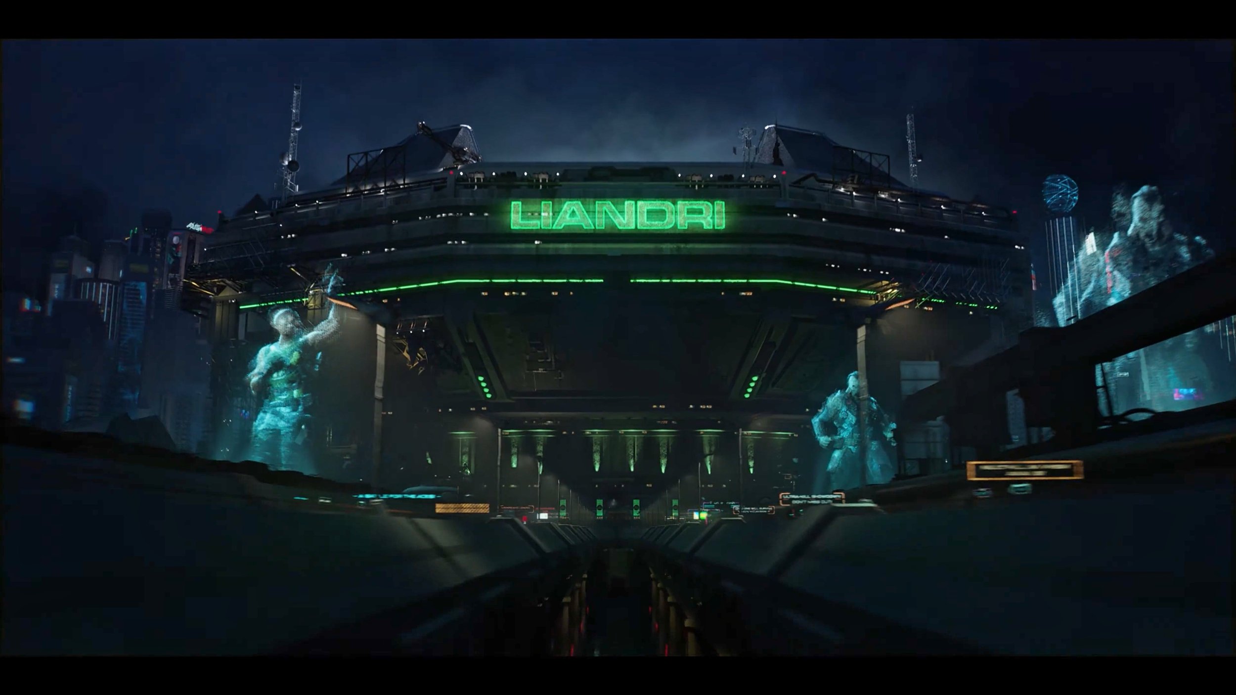 Futuristic city scene with a large aircraft carrier-like structure displaying the name 'LIANDRI' in green lights, surrounded by holographic human figures and skyscrapers in the background, under a dark sky.