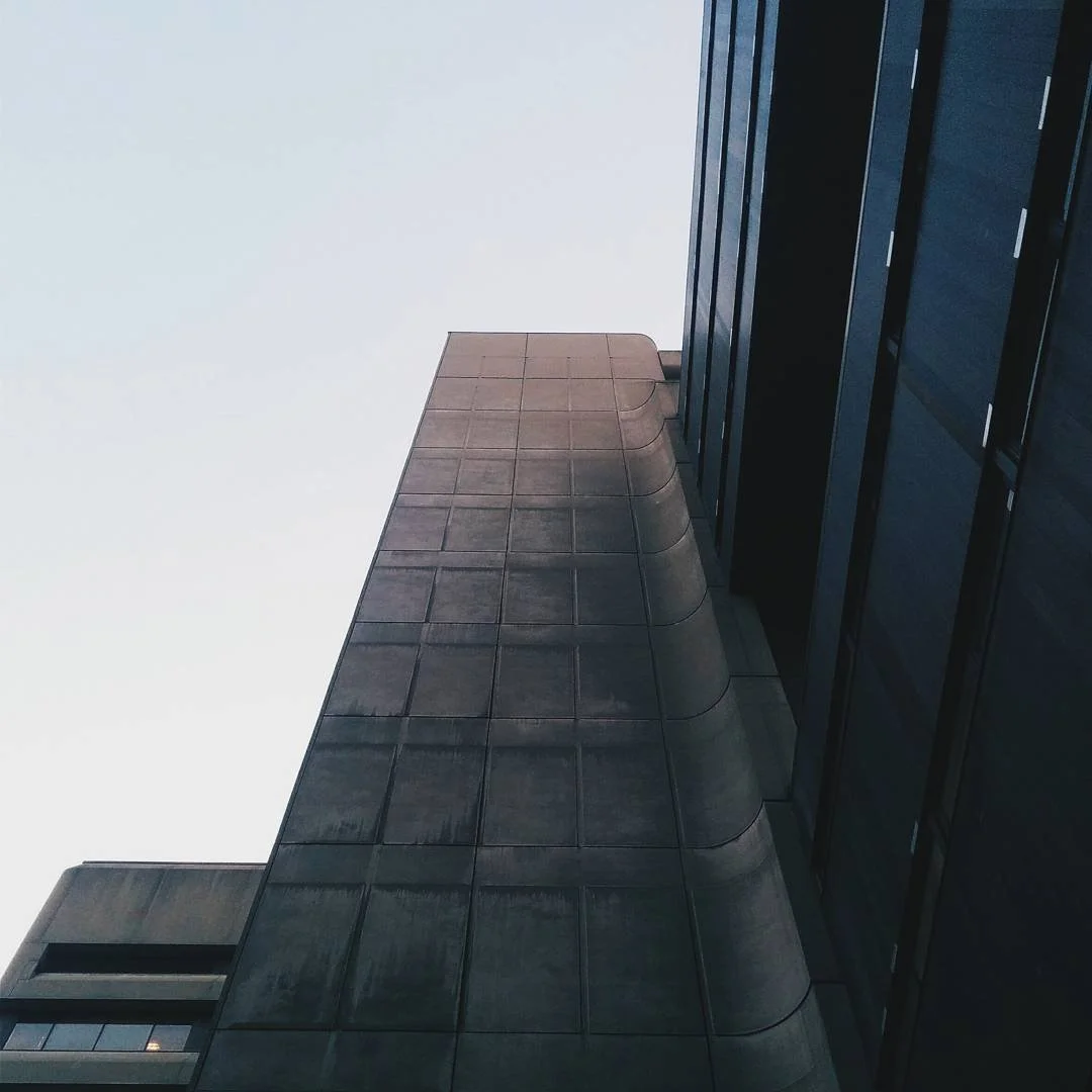 Low-angle view of a modern building against a clear sky