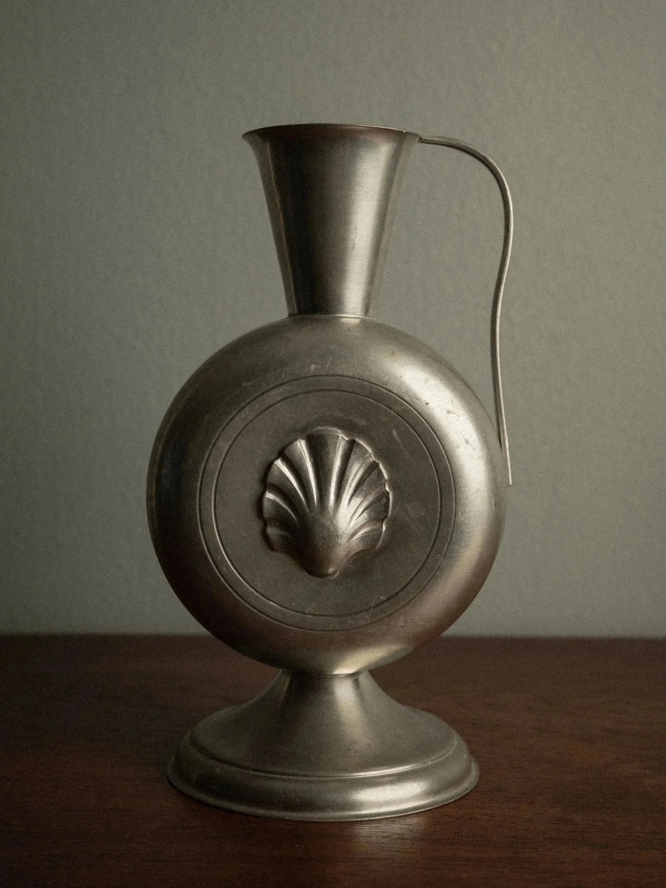 shell pewter vase
