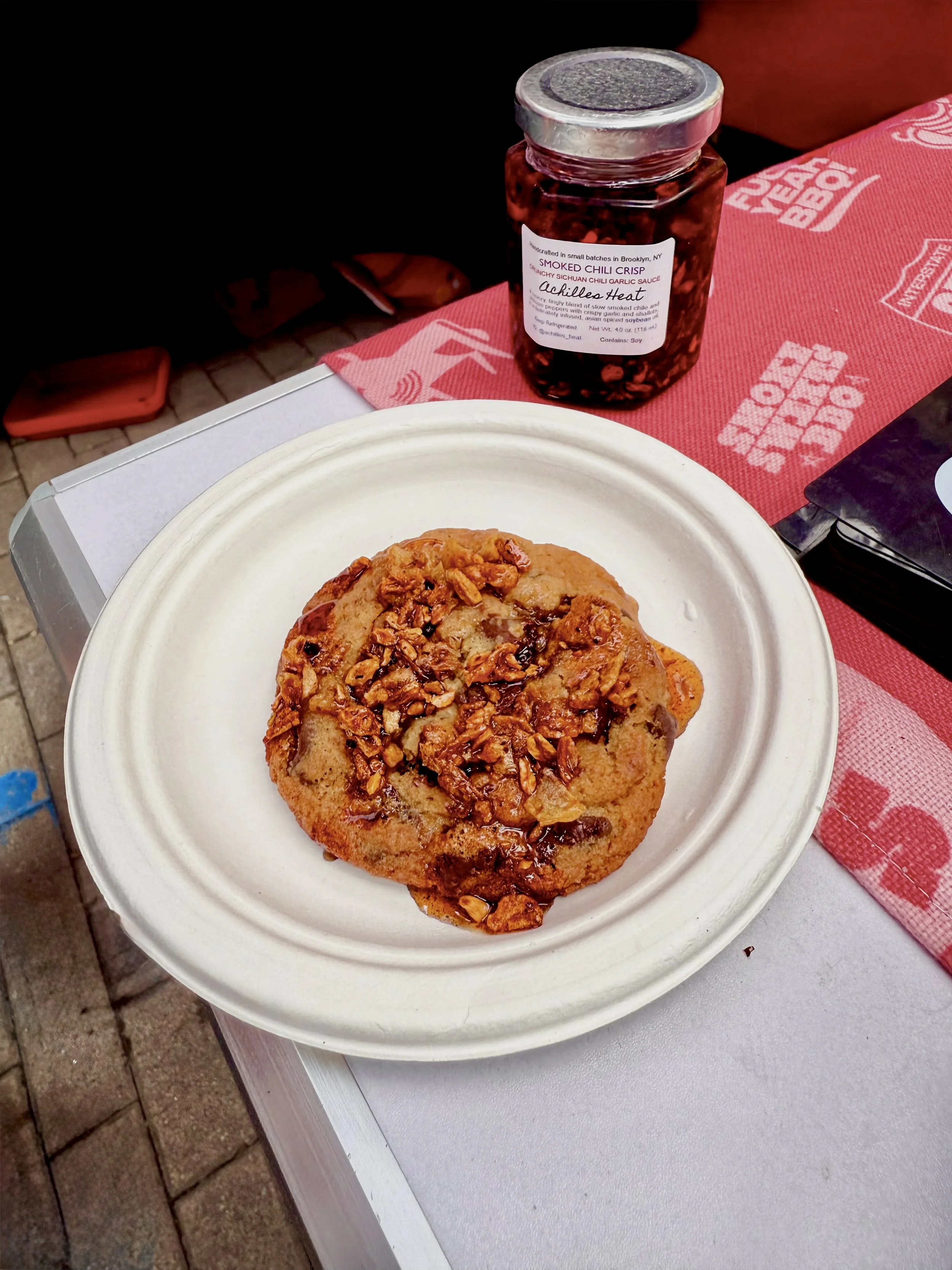 Chocolate chip sugar cookie by Chef Paige McMahon topped off with Achilles Heat Smoked Chili Crisp