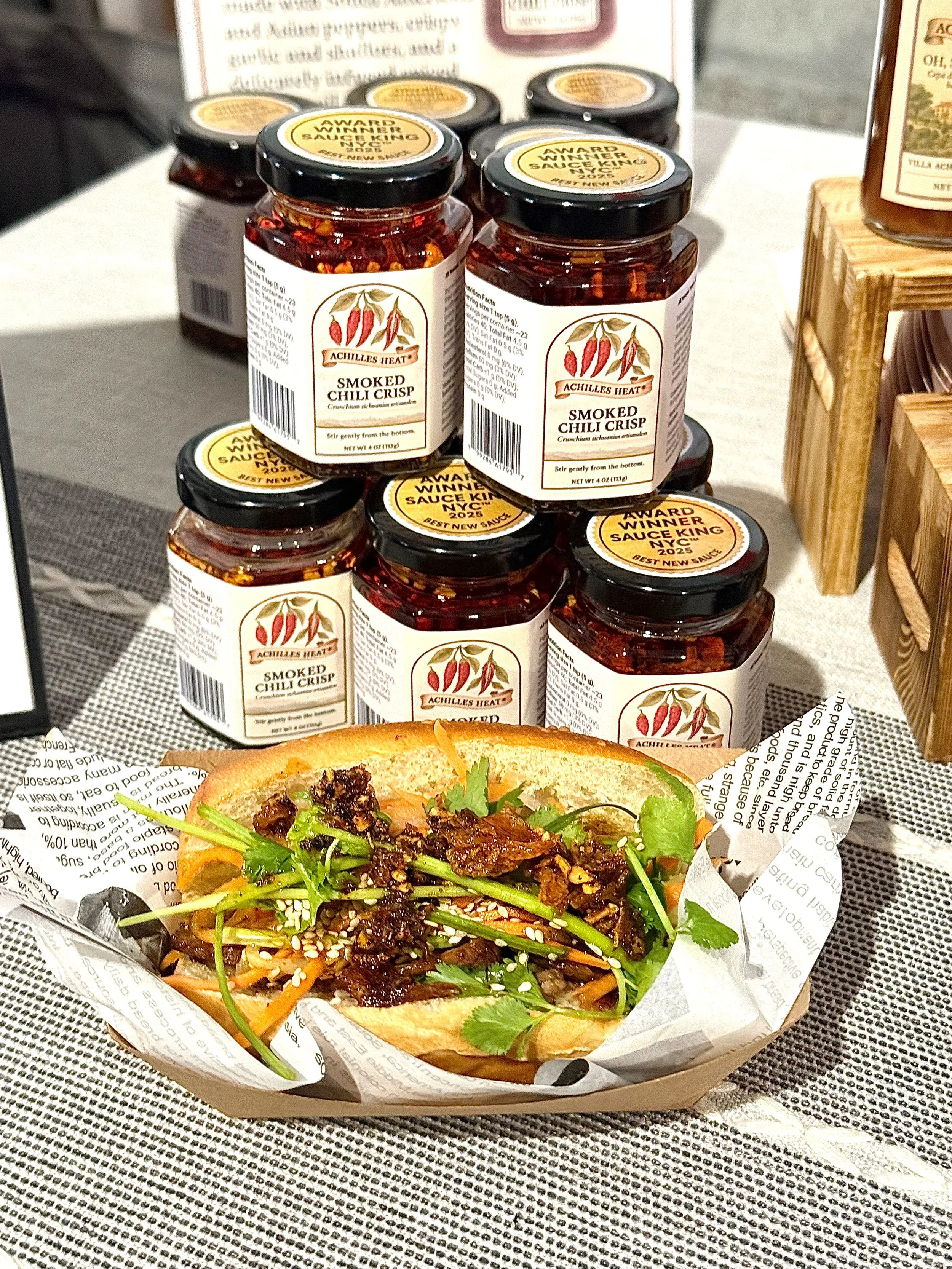 Pork Banh mi sandwich by Bếp Nhỏ topped off with Achilles Heat Smoked Chili Crisp
