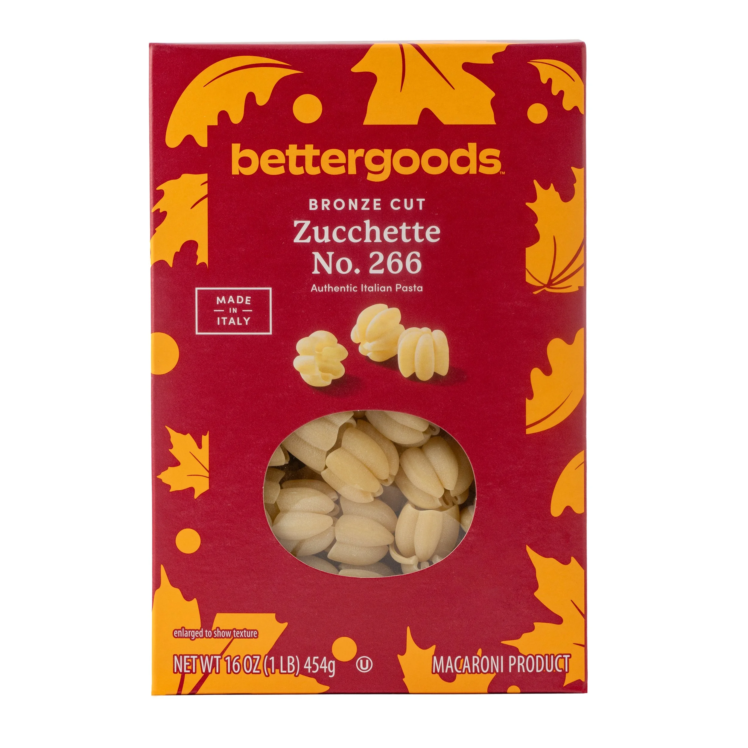 A box of Bettergoods Zucchette No. 266 Italian pasta with a transparent window showing the pasta inside. The box is red with orange and yellow leaf and circle decorations.