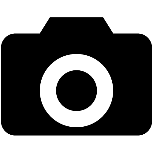 Icon of a camera with a large lens in the center.