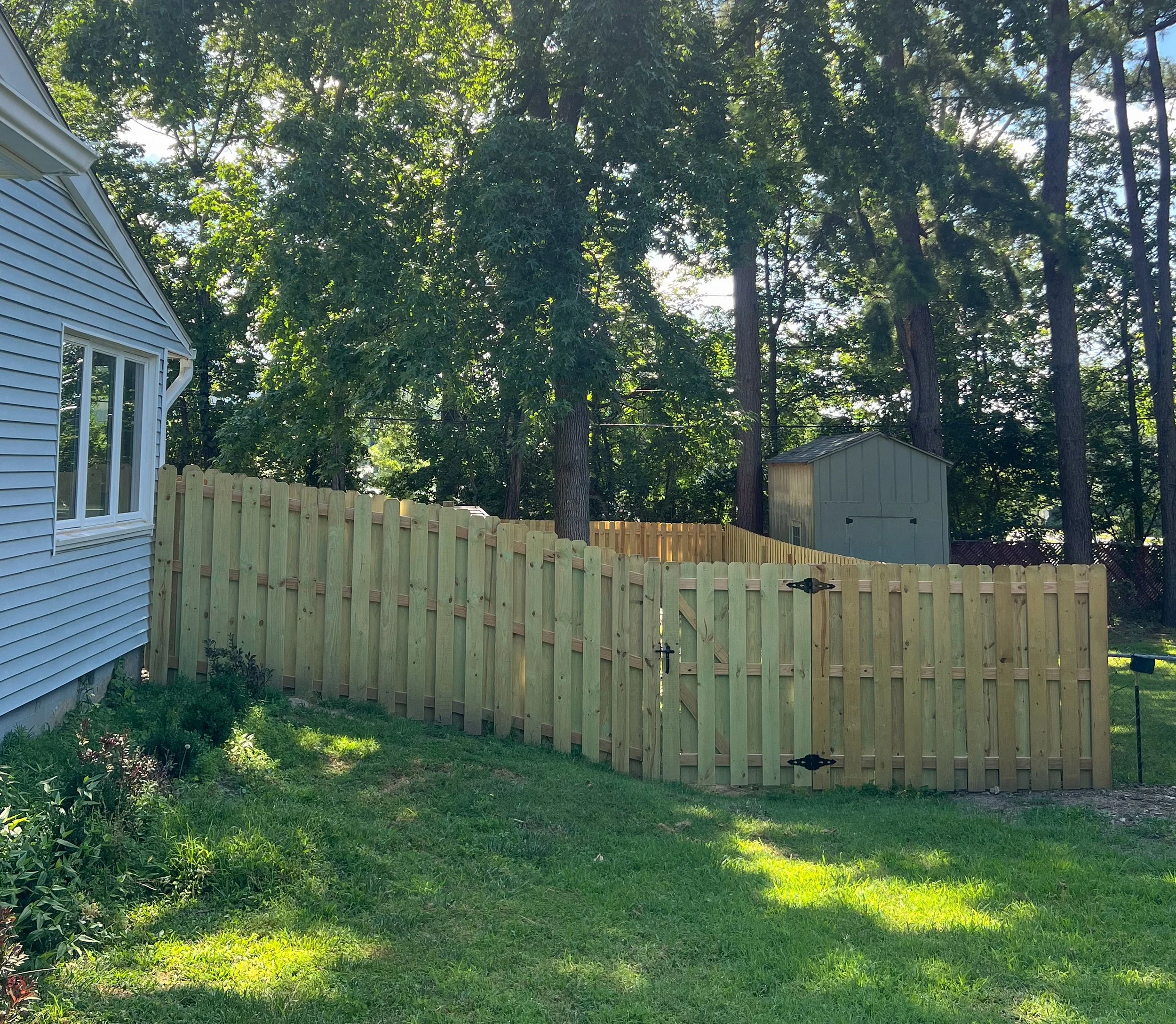 Alternating picket pattern detail for airflow and privacy - Fayetteville, AR