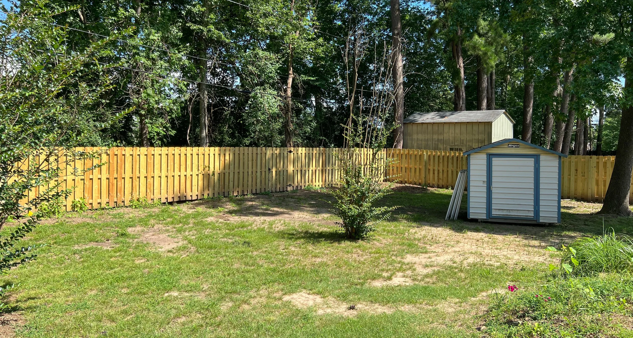 Final return section tying into property edge with precision - Fayetteville, AR