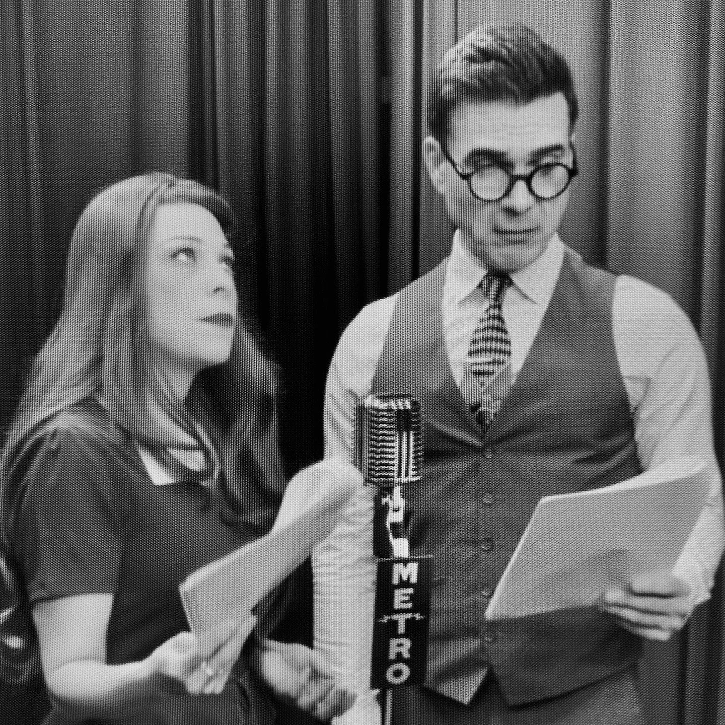 Well, it seems as though beautiful newspaper reporter Vex Voom (@laurmarcus) has roped her photographer chum F-Stop Fitzgerald (@domdan13) into yet another one of the screwy schemes she's concocted to score a scoop. But... shall they survive the shen